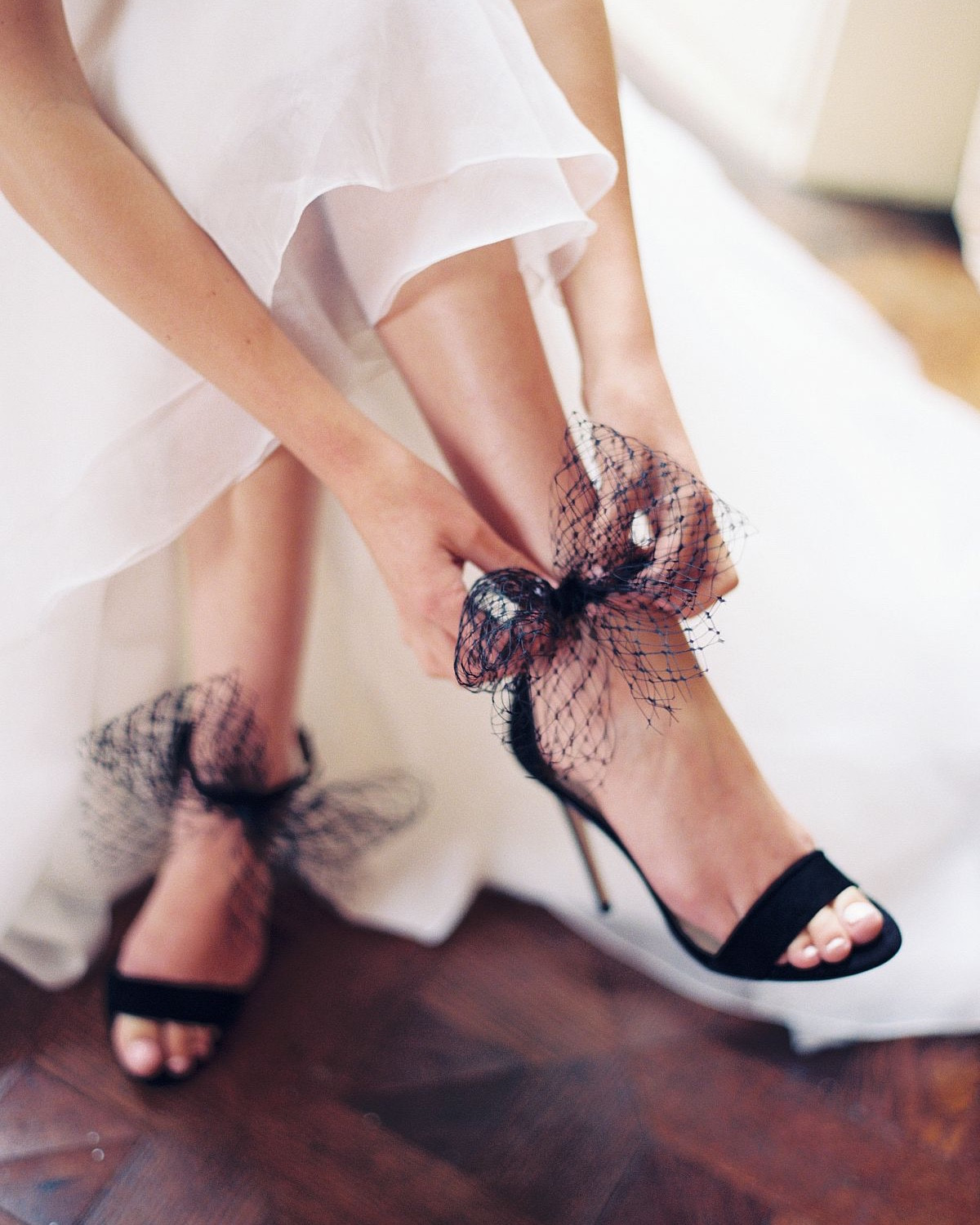 Looking for an alternative to traditional ivory bridal shoes? Black wedding shoes are a versatile option that you're more likely to repeat wear after the big day so when you take into account cost-per-wear maths, it makes total sense to invest in a fabulous designer pair!
Where to find chic black wedding shoes
For classic black wedding shoes like stiletto and block heel pumps, we love Bella Belle, Manolo Blahnik and Roger Rivier. If you're looking for black wedding shoes that are more of a unique statement pair, consider designers like Freya Rose, Christian Louboutin and Jimmy Choo. Discover some gorgeous real wedding inspiration plus our edit of the 20 chicest black wedding shoes to buy in 2024.

#LTKParties #LTKWedding #LTKShoeCrush