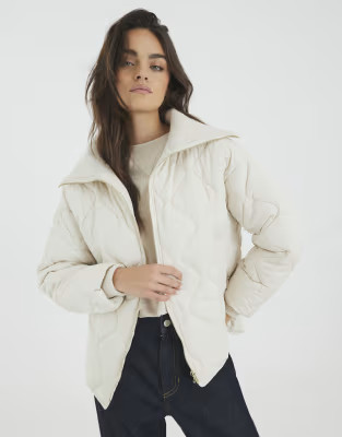 River Island Ribbed collar quilted jacket in cream | ASOS (Global)
