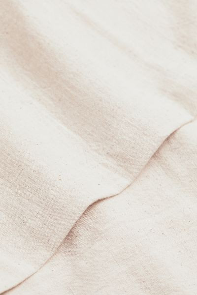 Mantel en mezcla de lino | H&M (FR, IT, ES, PT, BE)