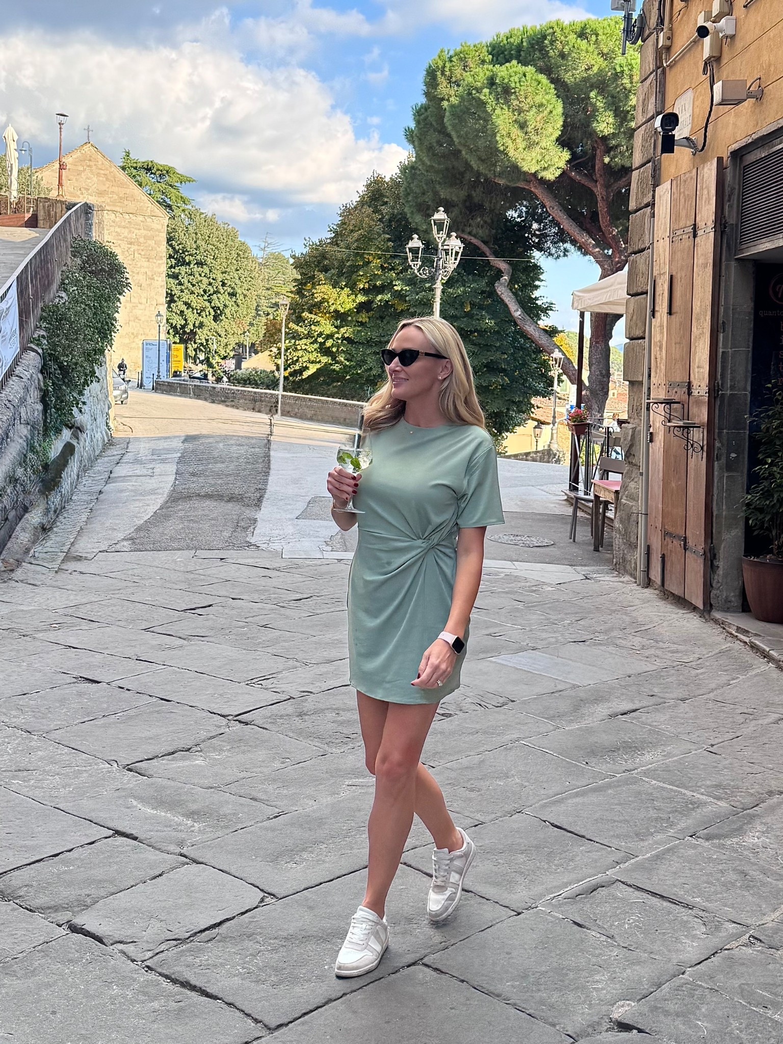 Casual chic for sightseeing days 💚 This knot-front dress is comfy yet polished- perfect for walking tours, travel days, or weekend errands. This Abercrombie dress is on sale now too! 

sage green dress, travel outfit idea, casual day dress, summer to fall outfit, walking outfit inspo, sneaker outfit, minimalist travel fashion, comfy chic outfit, neutral travel style, Italy travel, Europe travel outfit 

#LTKOver40 #LTKTravel #LTKSaleAlert
