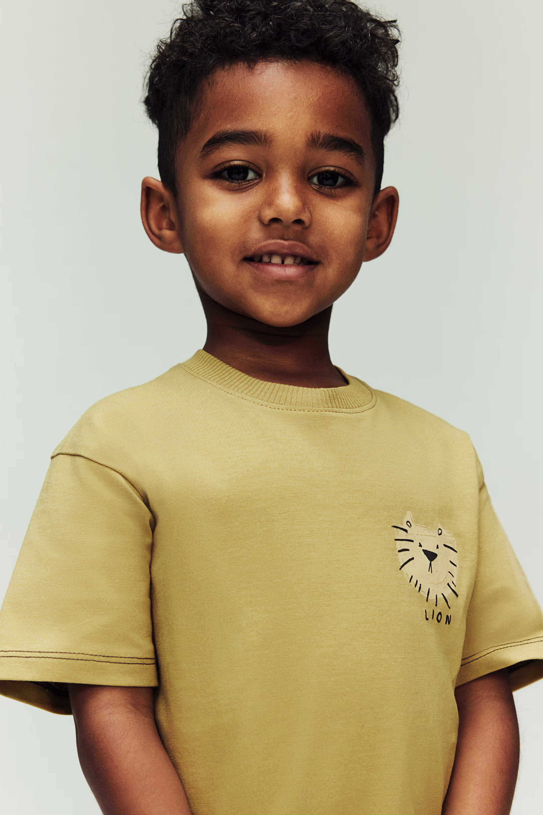 Pocket-detail T-shirt - Dusty yellow/Lion - Kids | H&M US | H&M (US + CA)