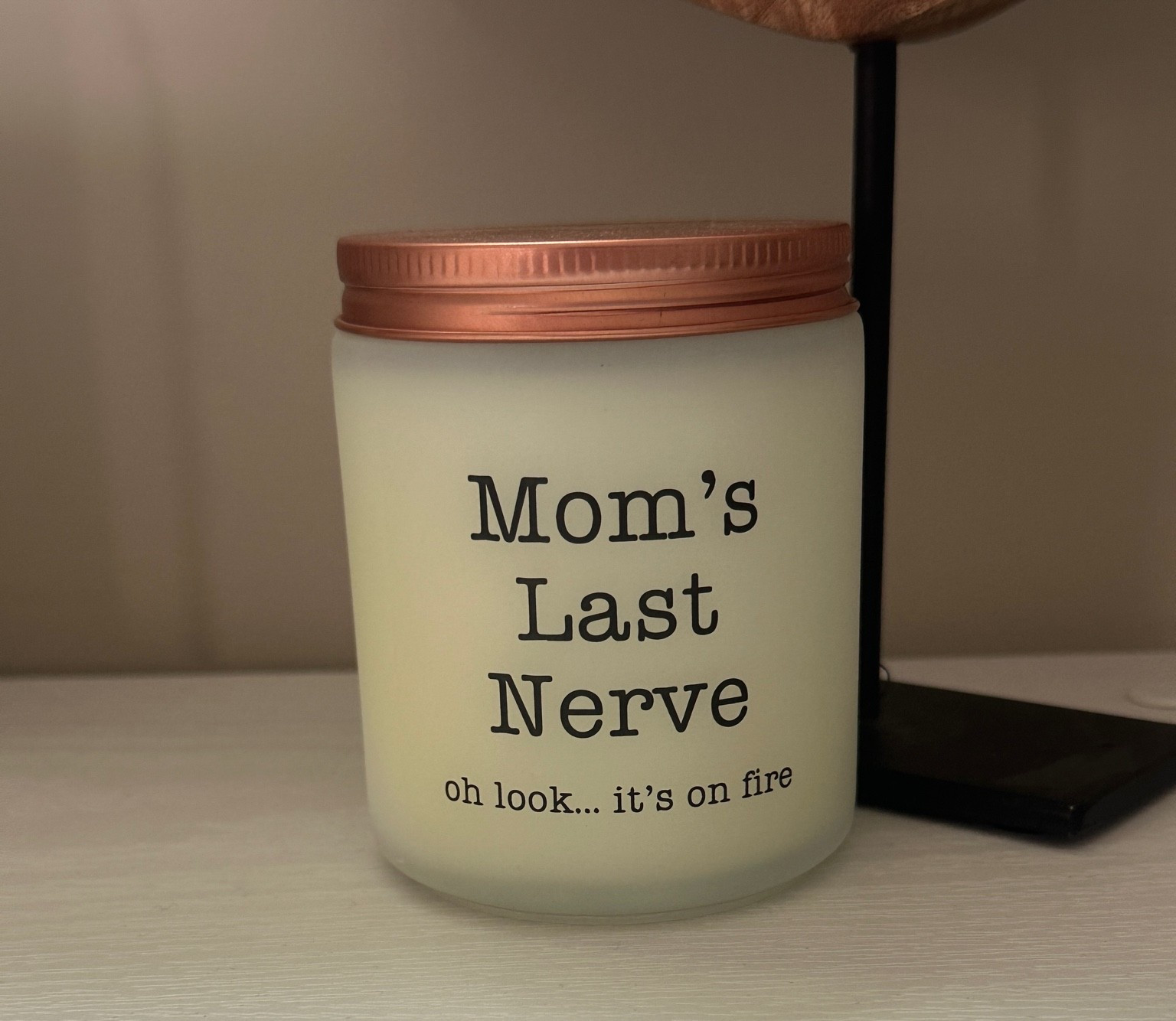 Got this candle in the mail from Lauren and it might be my most favorite gift ever!!! “Mom’s Last Nerve… oh look, it’s on fire.” 

So true it hurts. 🤭🔥

Tagging it below in case you need one too (or need to gift one to the mom in your life who’s hanging on by a thread).

#LTKdayinmylife #LTKmomlife #LTKHome