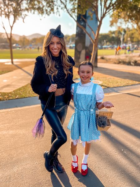 Wicked Witch and Dorothy 🎃 All pieces fit true to size.

Halloween costumes. Wizard of Oz. Dorothy costume. Witch costume. Red shoes. Boots. Witch broom. Witch hat. Toto. Sparkly top. Faux leather pants. Trick or treat. Halloween. Costumes. Family costumes.

#ltkunder100 #ltkunder50 #stylewithjen #jenniferxerin

#LTKHalloween #LTKfamily #LTKkids