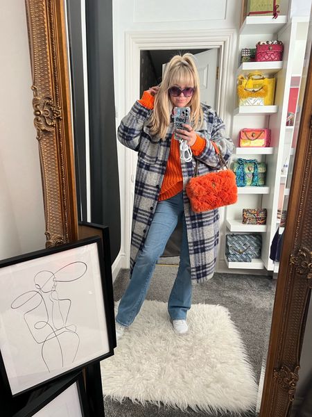 Orange you glad I'm not feeling too plaid about this outfit? 😜 Embracing the vibrant hues and checks! #FashionFun #ootd 

Ps. Obsessed with my new @posterstore frame and artwork – it fits right in with the rest of my collection! 🖼️✨ #GalleryGoals #PosterPerfect 

#LTKeurope #LTKstyletip #LTKhome