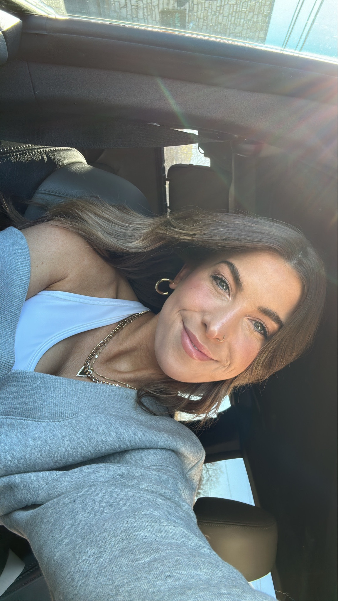 perfect selfie lighting! haha i am wearing a small in the nike sports bra and a medium in the oversized sweatshirt!

necklaces are the 15.5” “heart only” option and the 18” curb chain!

#LTKSeasonal #LTKfindsunder50 #LTKfindsunder100