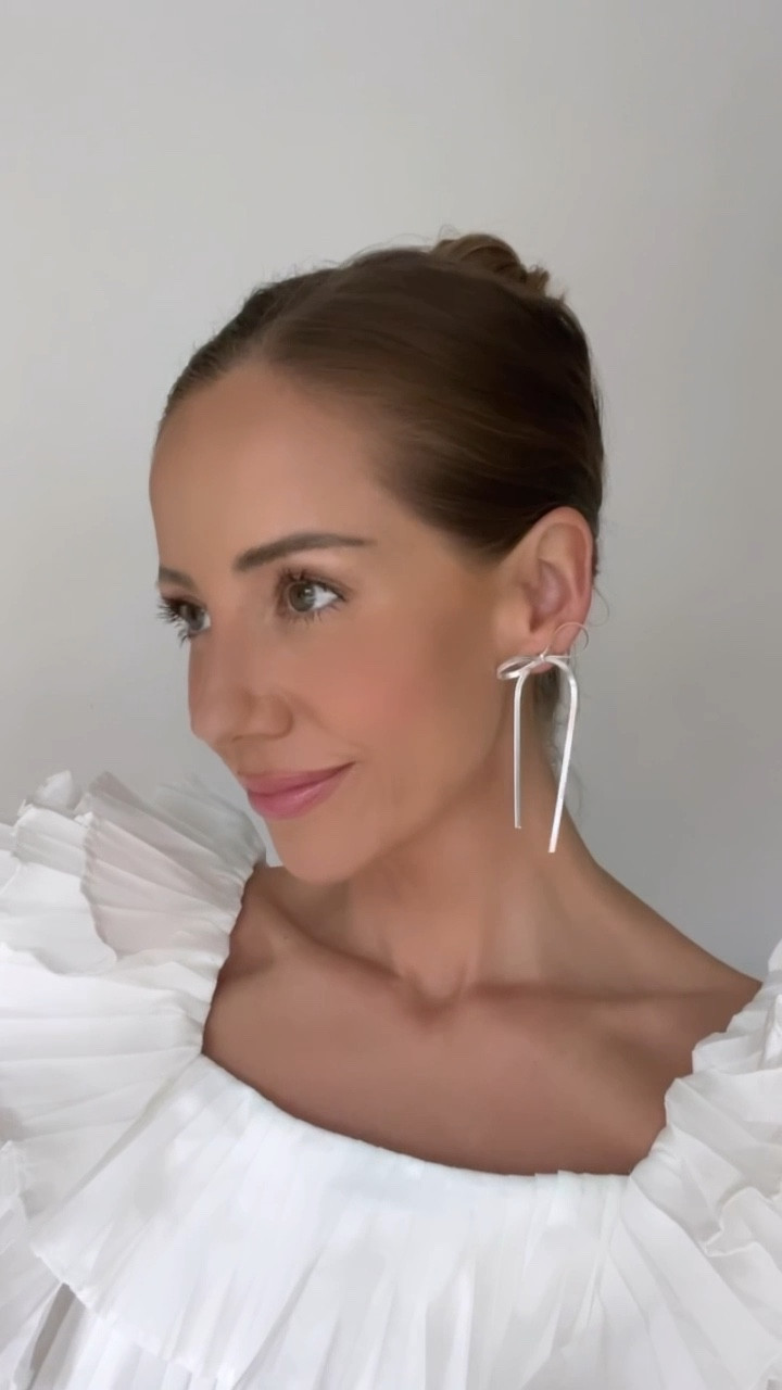 these are so beautiful for any occasion!! they says back ordered but the came in so fast 🤷🏼‍♀️ what a PERFECT gift for bridesmaids.

they’re stealing silver and so lightweight and look double the price on.

Holiday earrings, nye outfit, nye style, bridal earrings, weddings, silver bow earrings, bow style, chic jewelry

#LTKfindsunder50 #LTKGiftGuide #LTKwedding