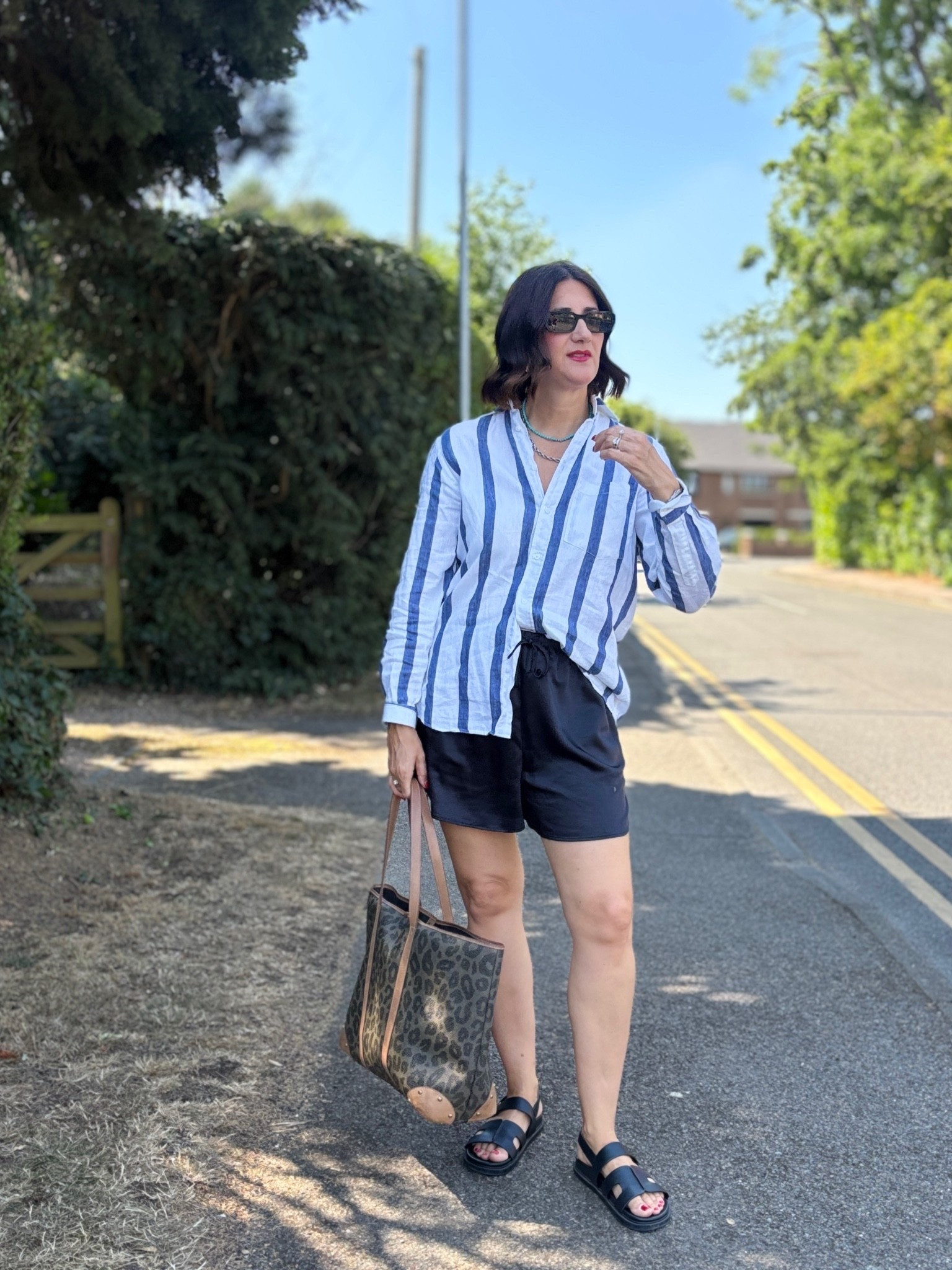 With nothing underneath Linen stripe shirt & satin shorts

#LTKsummer