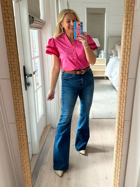 This pink top with the Rick rack sleeves is so cute and total perfection for winter into spring. I am wearing a size small. The jeans are my favorite player denim that are under $100 and you can grab them both for 15% off with code Fancy15.

#LTKSeasonal #LTKfindsunder100 #LTKstyletip
