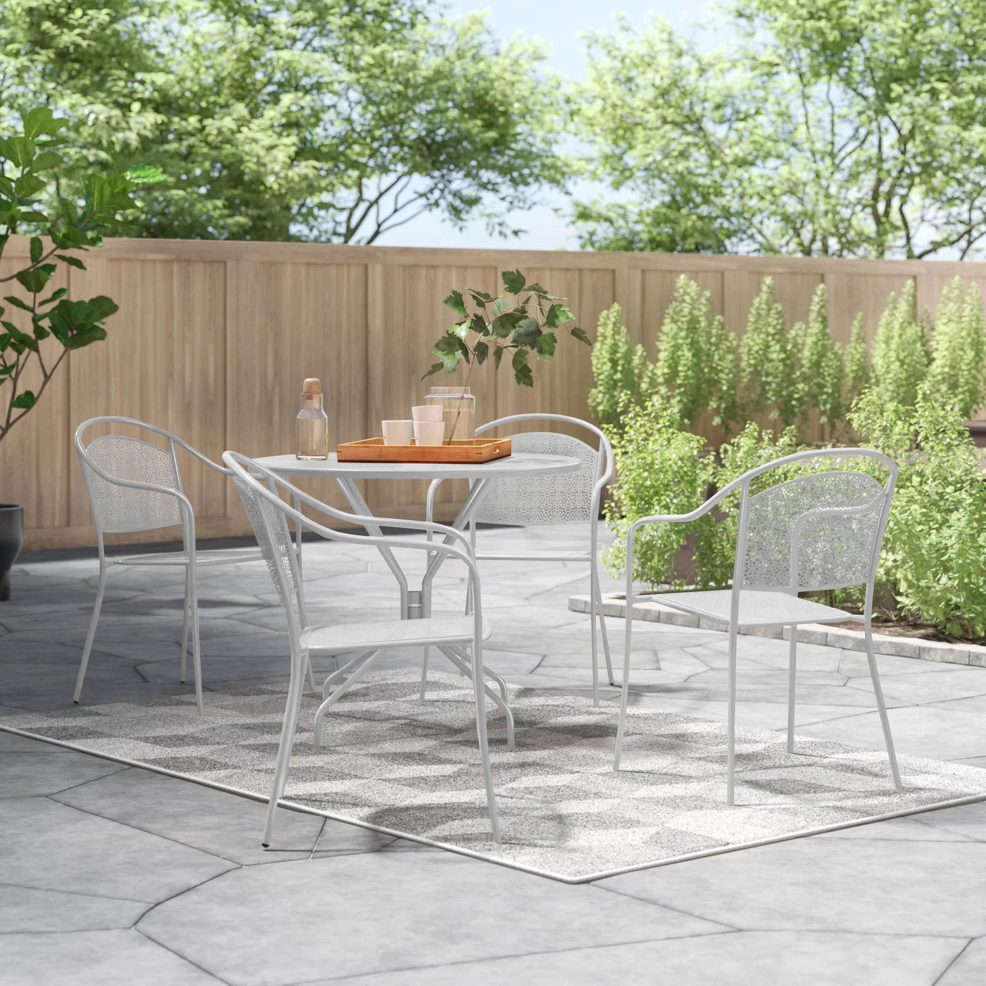 Wade Logan® Chanea 35.25'' Round Indoor-Outdoor Steel Patio Table Set with 4 Round Back Chairs &... | Wayfair North America