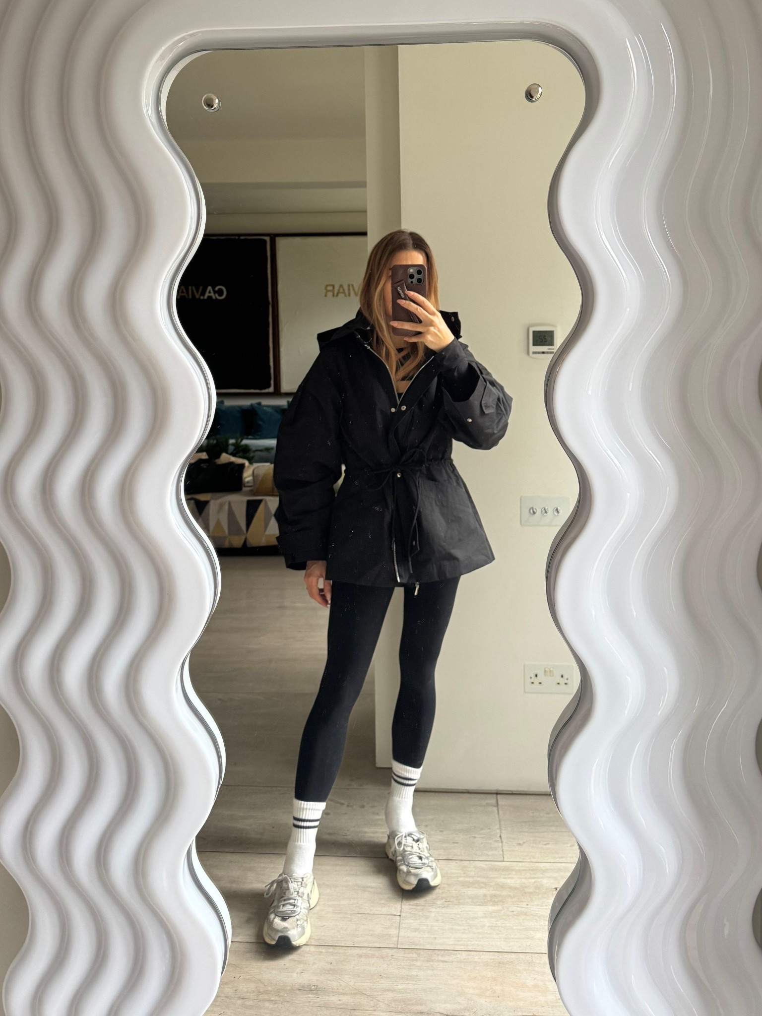 Wearing size XS in the raincoat 