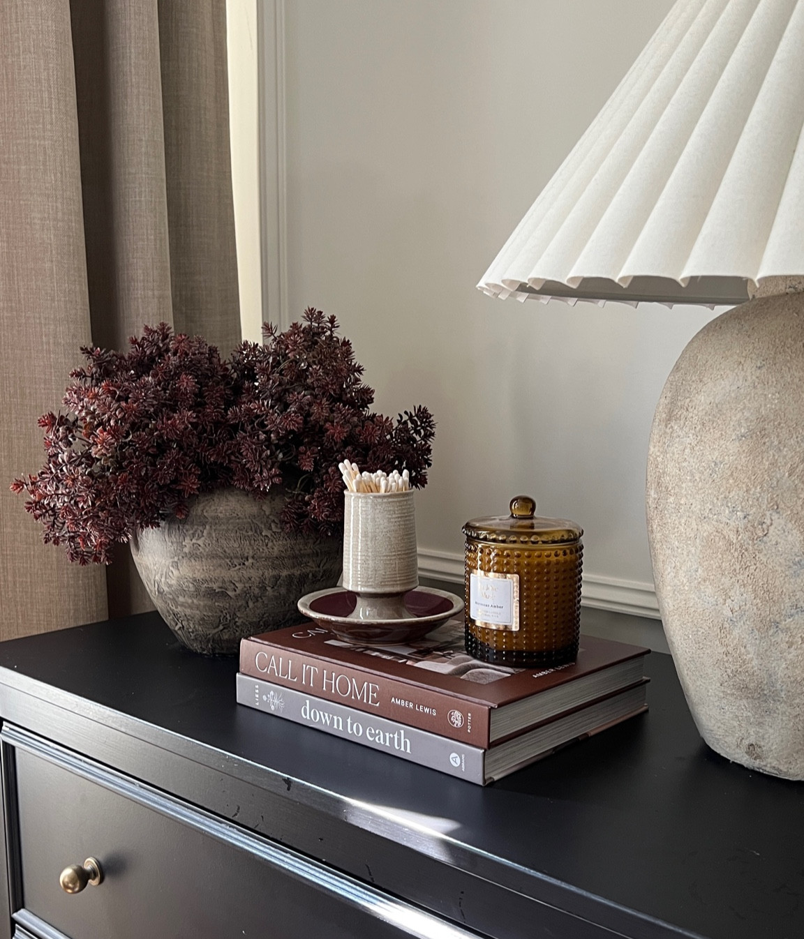 Match striker coffee table books hobnail candle pleated lampshade neutral curtains 

#LTKfindsunder50 #LTKstyletip #LTKhome