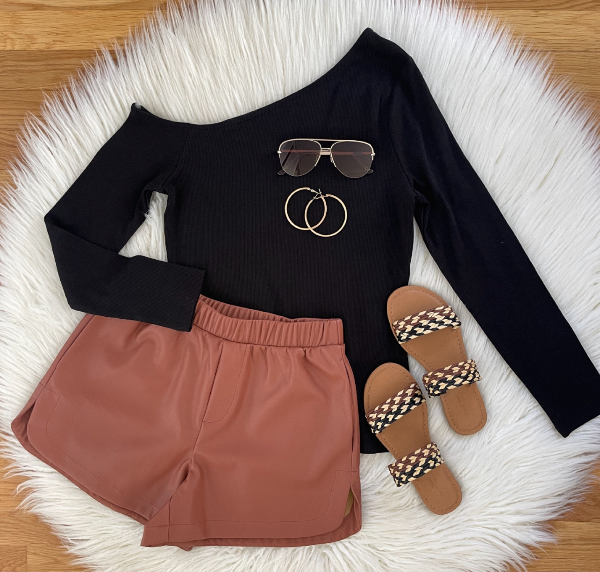 Here’s some more outfit inspo for you tonight 🖤 This fun top goes perfectly with these faux leather shorts & new sandals for a fun spring look!  The top also comes in violet & white! Check out my stories & bio for links. Have a great night!! 

#LTKstyletip #LTKfindsunder50