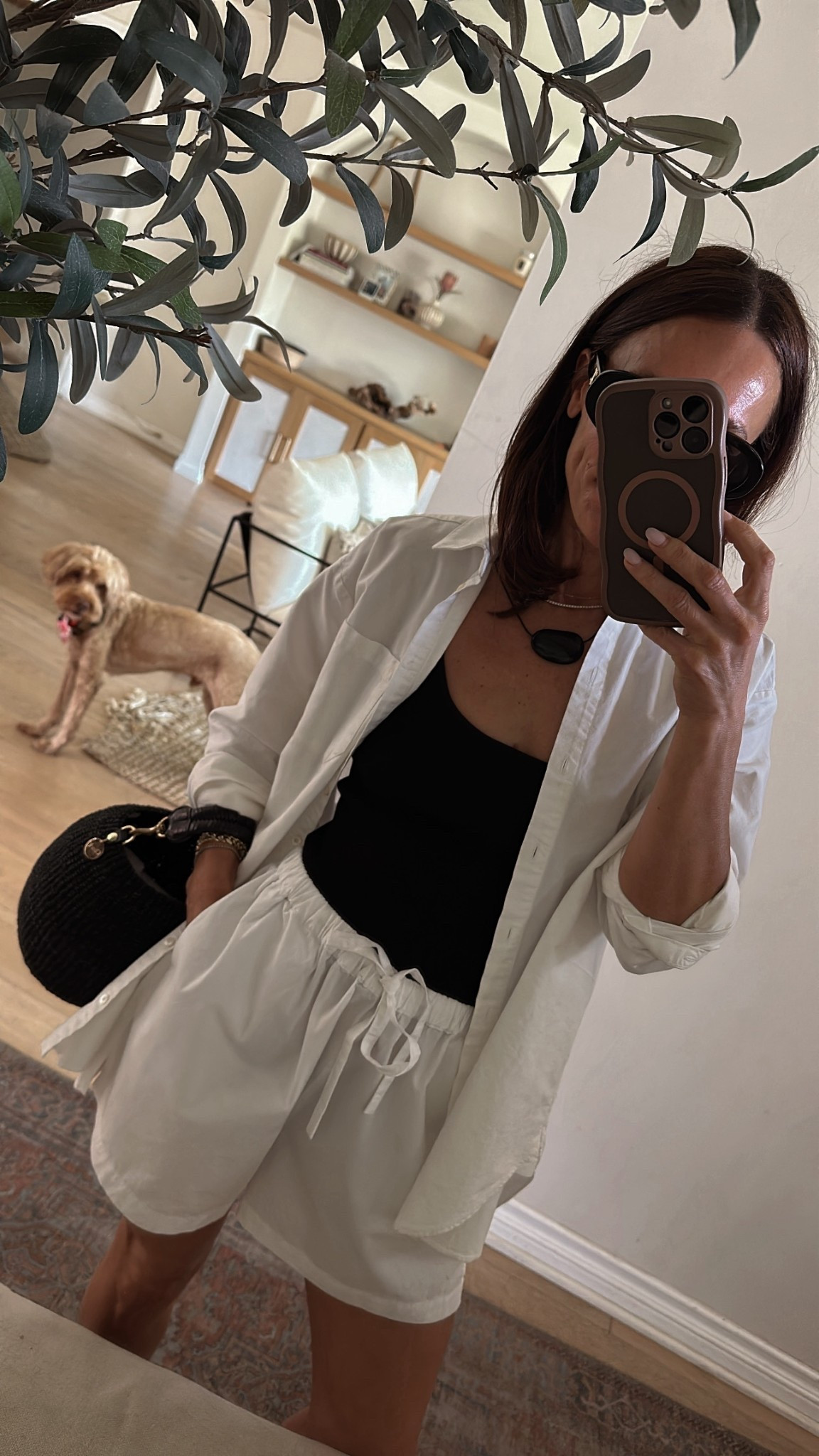 Another easy way to wear an oversized white button down in the spring and summer season. Size down in shorts 

#LTKPetite #LTKOver40