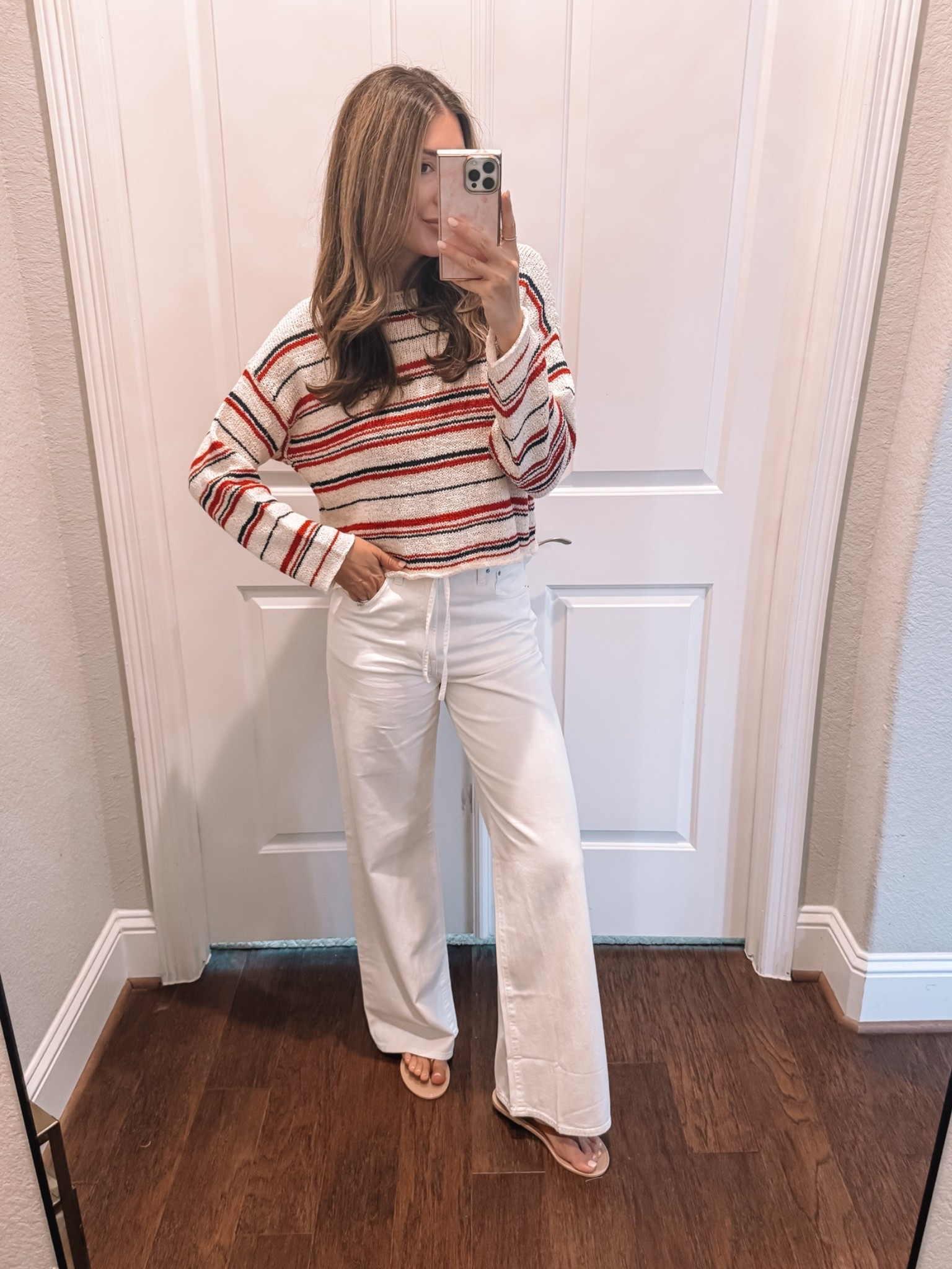 Small in sweater, size 27 in jeans (sized up for slouchier fit)