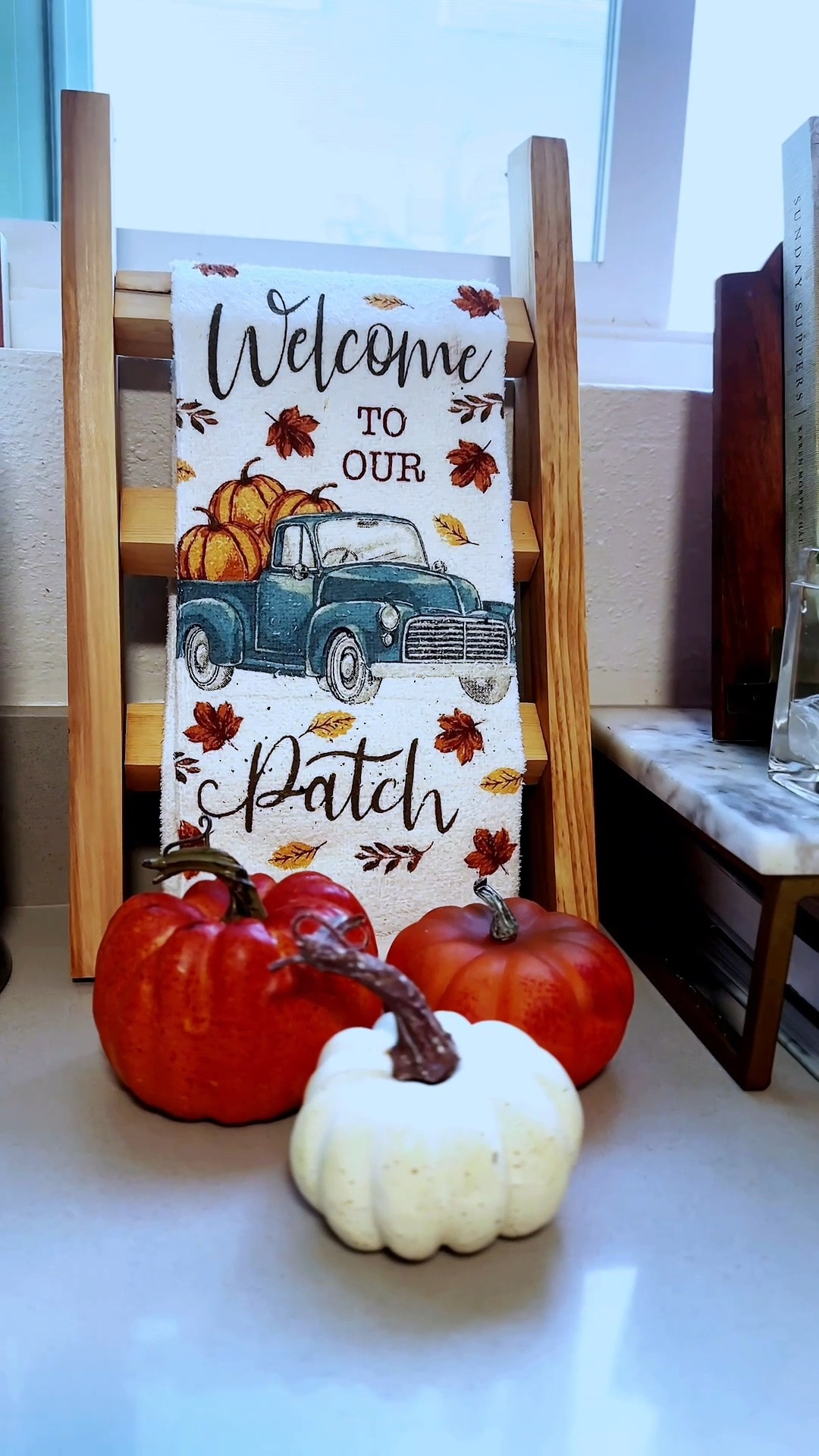 Small ladder, big fall energy 🍂 I’m obsessed with this little kitchen towel ladder.  I think I’m gonna get a few more for the bathrooms. 

Styled this little wooden ladder with the cutest “Welcome To Our Patch” towel and a trio of mini pumpkins for an instant kitchen counter refresh. Proof you don’t need a full overhaul to get cozy for the season — just a few sweet touches.

#LTKHome #LTKSeasonal #LTKvlog