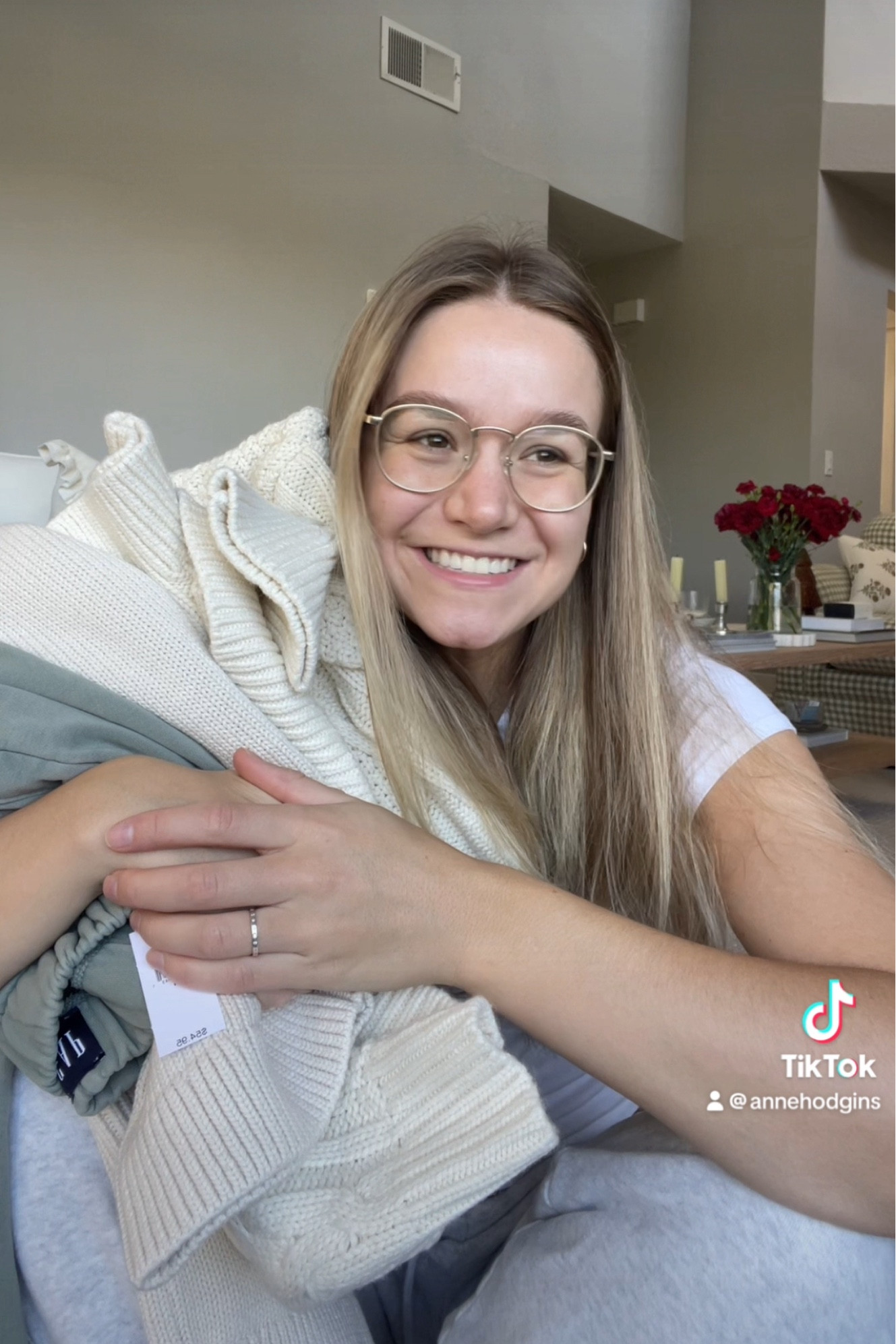 M/L in the cable knit sweater. Medium in the cardigan. Medium in the sweatpants