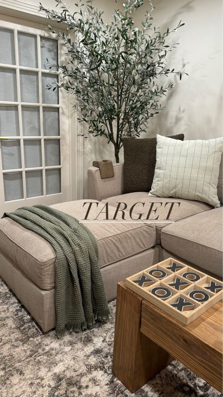 Target living room home finds 
Spring throw pillows
Throw blanket
Tic-tac-toe game 
Olive tree 
Vintage looking artwork 

@target #ad #targetpartner #target  @TargetStyle