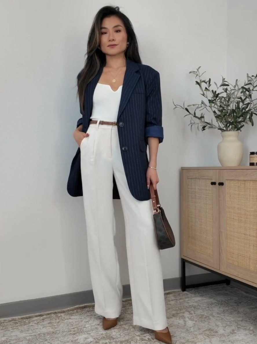 Navy Pinstripe Blazer & White Trousers Work Outfit 

▶  my measurements: 5’2” / 100 lbs / 32B / 00 bottoms
▶  watch the full video on YouTube 

LOVING this oversized navy and white pinstripe blazer [XXS] - it pairs perfectly with crisp white

#LTKStyleTip #LTKWorkwear #LTKSeasonal
