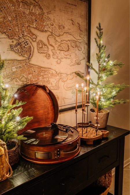 Who is playing Christmas tunes this weekend?! We’ve had this record player for years and love it. (Streams via Bluetooth from our phones too if we don’t want to play actual records.) 

#recordplayer #christmasdecor #walmart #christmas #tabledecor #holidaydecor #vintage #vintagedecor #homedecor 



#LTKSeasonal #LTKHoliday #LTKhome