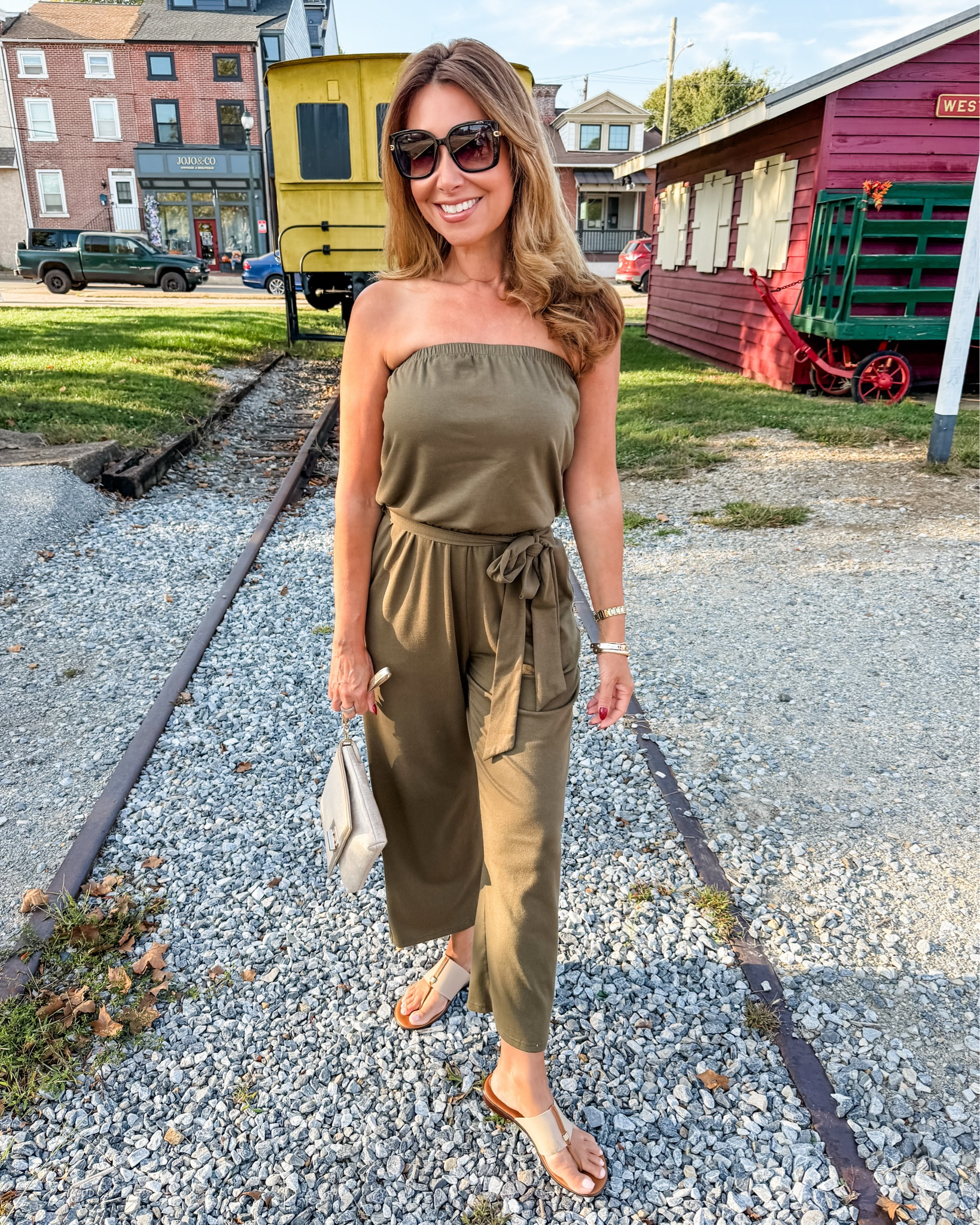 Early-fall perfection 🍂 Wore this strapless wide-leg jumpsuit to a surprise party — easy, flattering, and chic from day to night. Love the tie waist and flowy fit!

#FallStyle #JumpsuitOutfit #LTKStyle #OOTD #EffortlessStyle #FallFashion


#LTKParties #LTKStyleTip