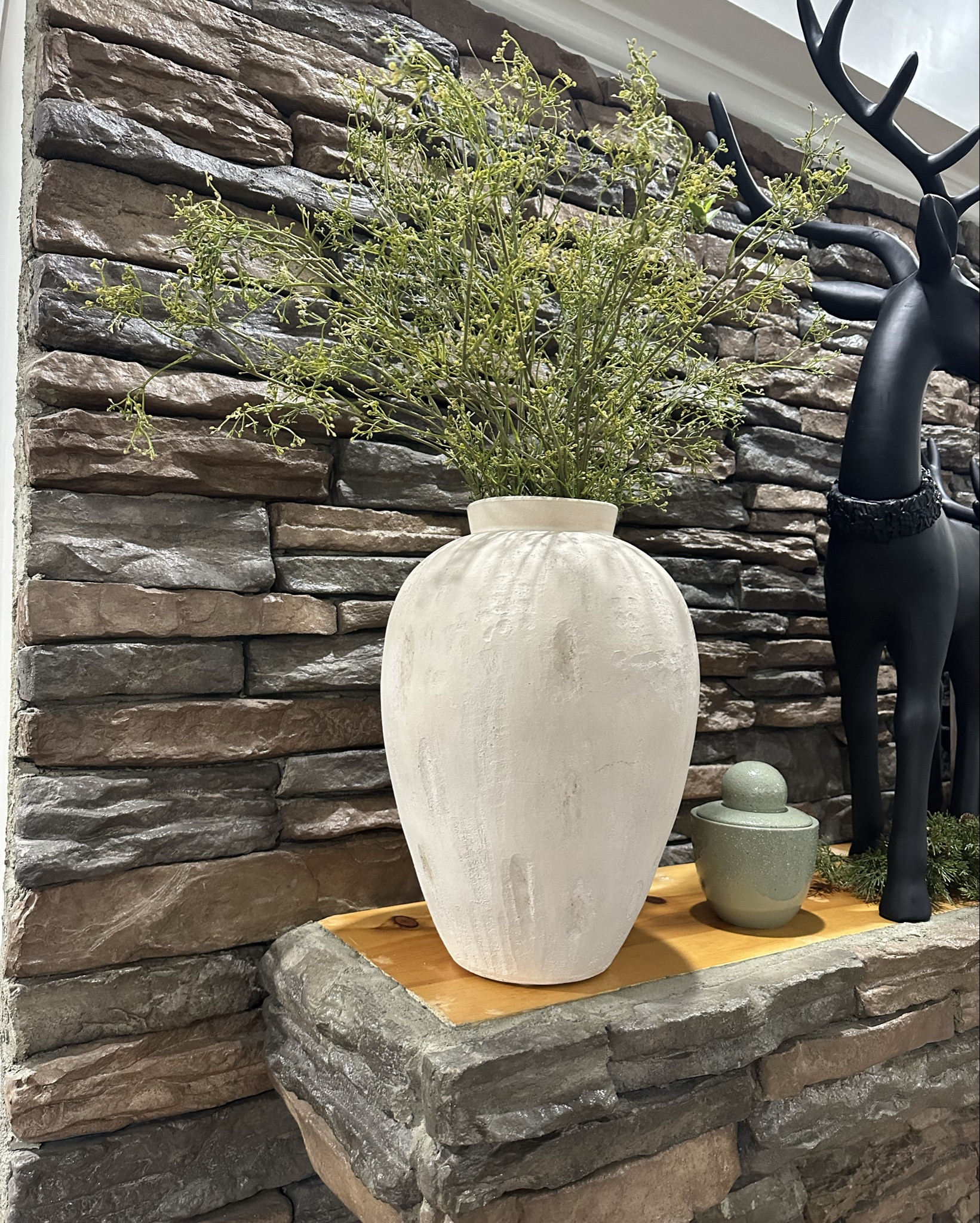 This vase gives my PB vibes I was able to score the new Rustic Ceramic Vase by Threshold I love the beige hue and textured pattern on this vase. I added some faux dried rice stems to add character, charm and interest to the vase. 