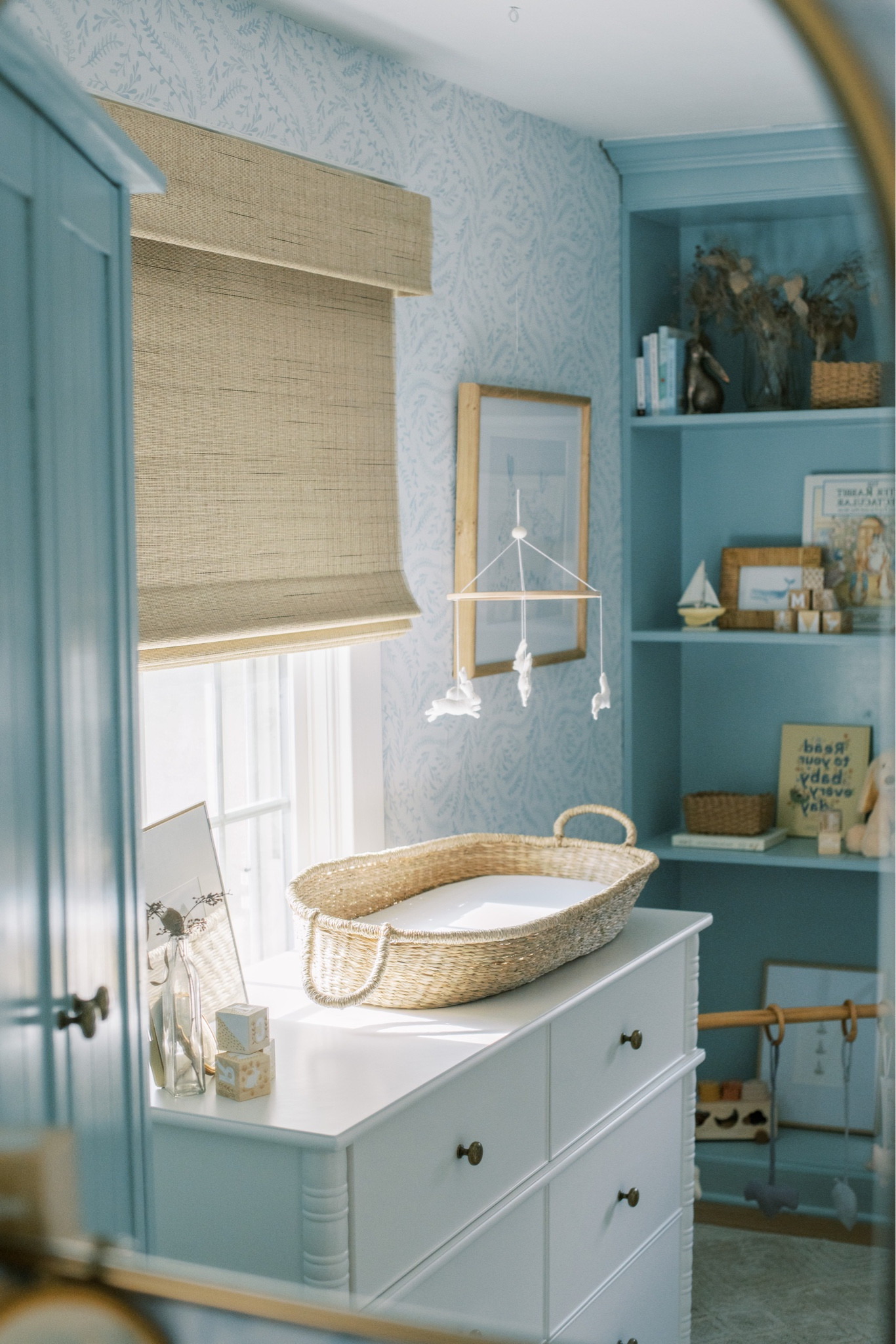 Taking in these last days of just us three and prepping all the things for our little soon to be ✨ In case you missed it, I’m recapping everything this week over on stories. From the latest finds to a renovation update! Happy Sunday ☺️
•
📸: the lovely @meganharrisphoto
•
•
•

baby nursery, blue wallpaper, white crib, glider, neutral loloi rug, soft rug, Roman shades, nursery design, nursery decor, woven hamper, crib skirt, gender neutral nursery, calm nursery, pouf, brass mirror, nursery shelf decor, changing table, woven changing basket, rabbit mobile, baby mobile, hutch
#nursery #nurserydecor #nurseryinspo #nurserydesign #nurseryinspiration #babyroomdecor #babyroom #neutralnursery #genderneutralnursery #homedecor #wallpaperwednesday #homedesign #potterybarn #glider #crib #maternityshoot #maternityphotography #ltkhump #ltkbaby 
#pregnancyannouncement 
#liketkit  Shelf decor 