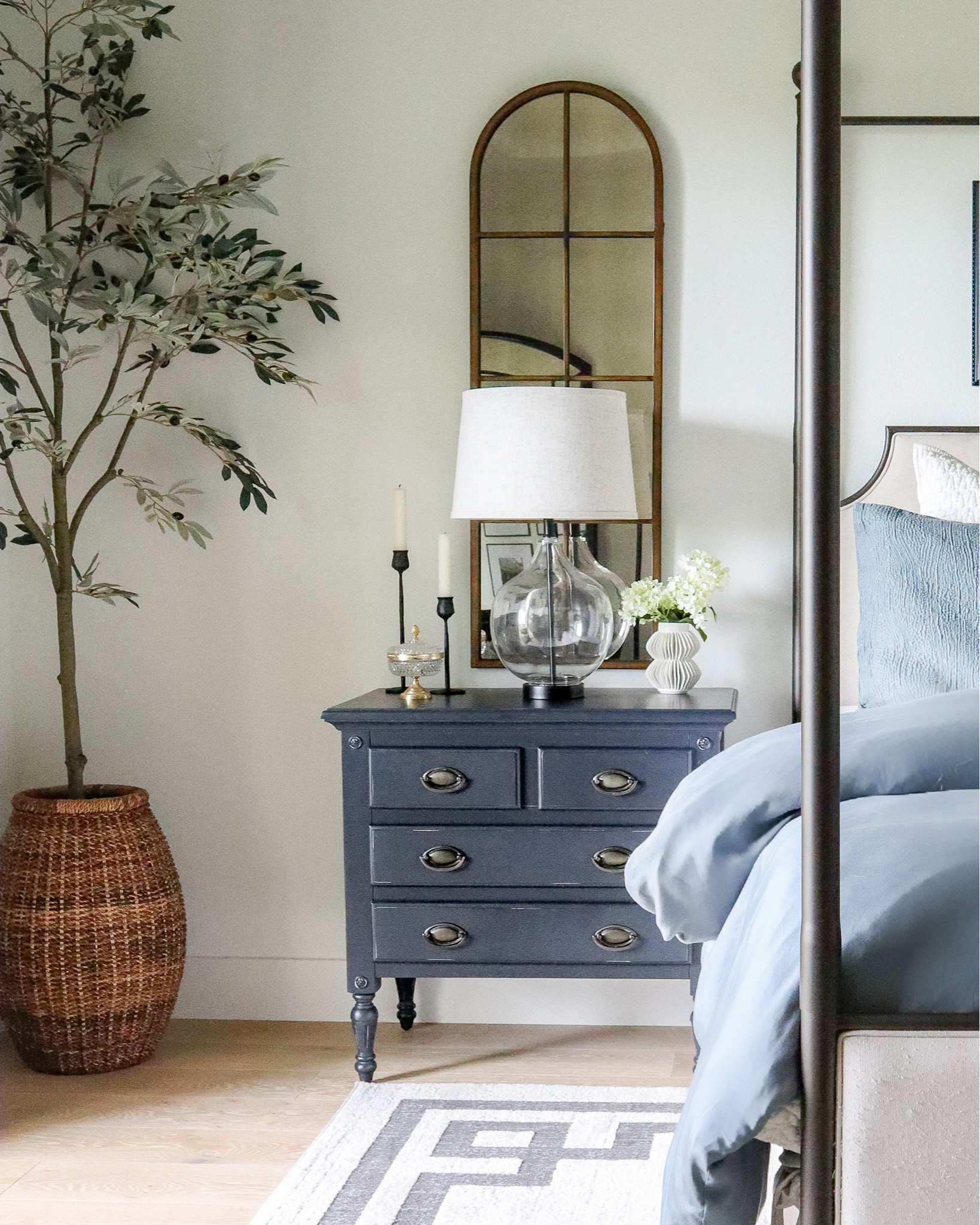 Bedroom nightstand and corner decor. I just saw that my nightstand is now available on Amazon! — bedroom lamp, faux olive tree, candleholders, vase, arch mirror

#LTKhome #LTKstyletip #LTKsalealert