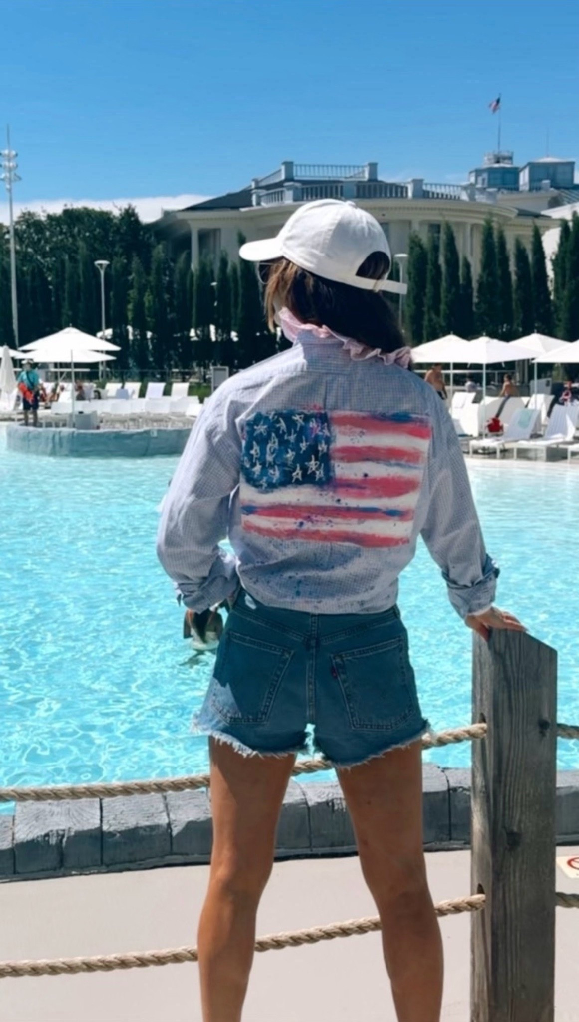 My custom flag button up shirt is by Liz Carter and tagged in my Instagram. I linked similar Levi shorts that I paired it with