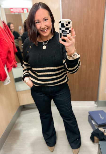 Pullover sweater on sale for $19.20!  Wearing an xxl in mine. Runs small!  Size 14 flare jeans. Love these!  Boots fit tts. 30% off right now too!  

#LTKsalealert #LTKmidsize #LTKSeasonal