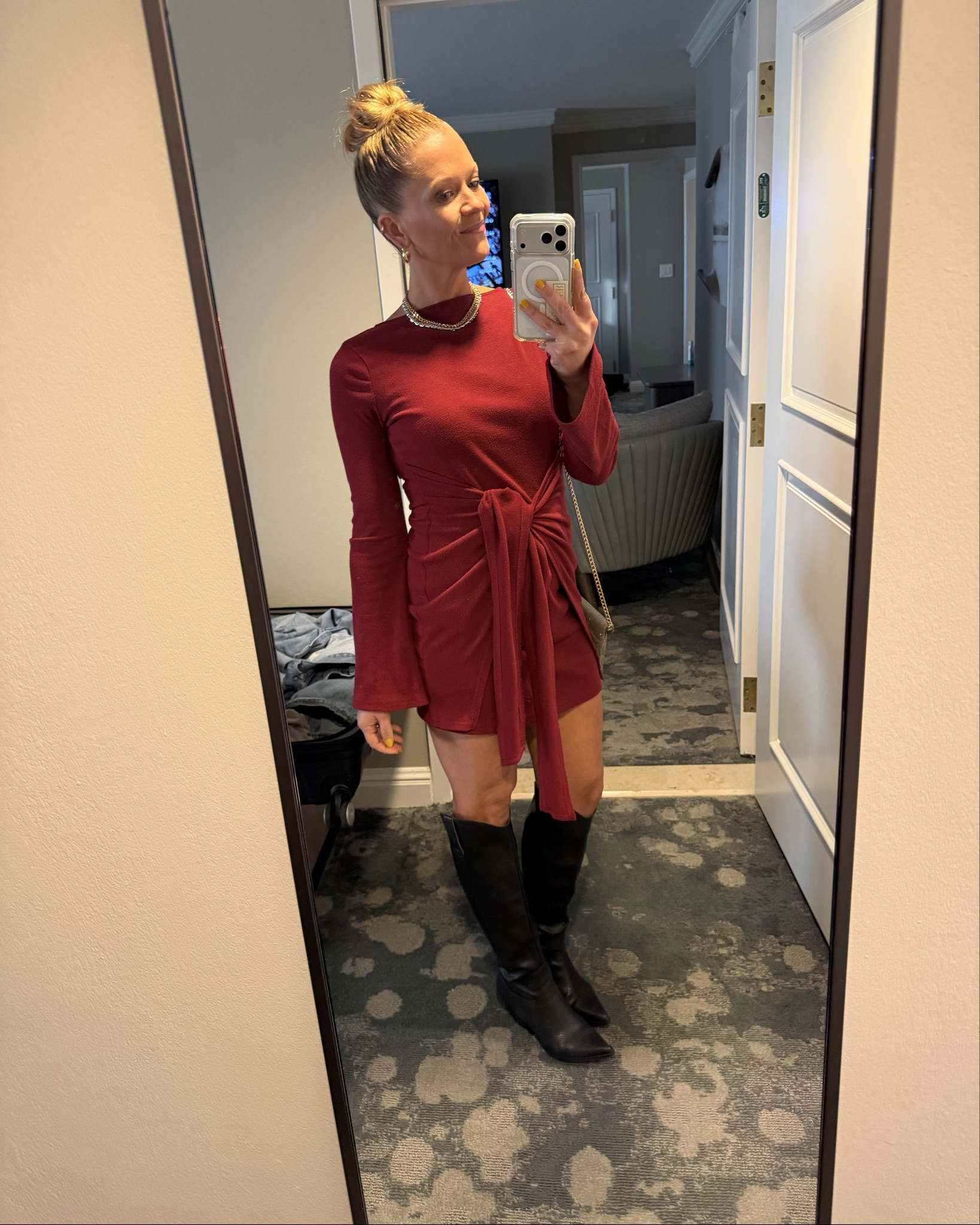 Sweater dress, wrap tie in front they is flattering on the mom pooch. Dinner fit you can dress up or down. 

#LTKWorkwear #LTKOver40 #LTKootd