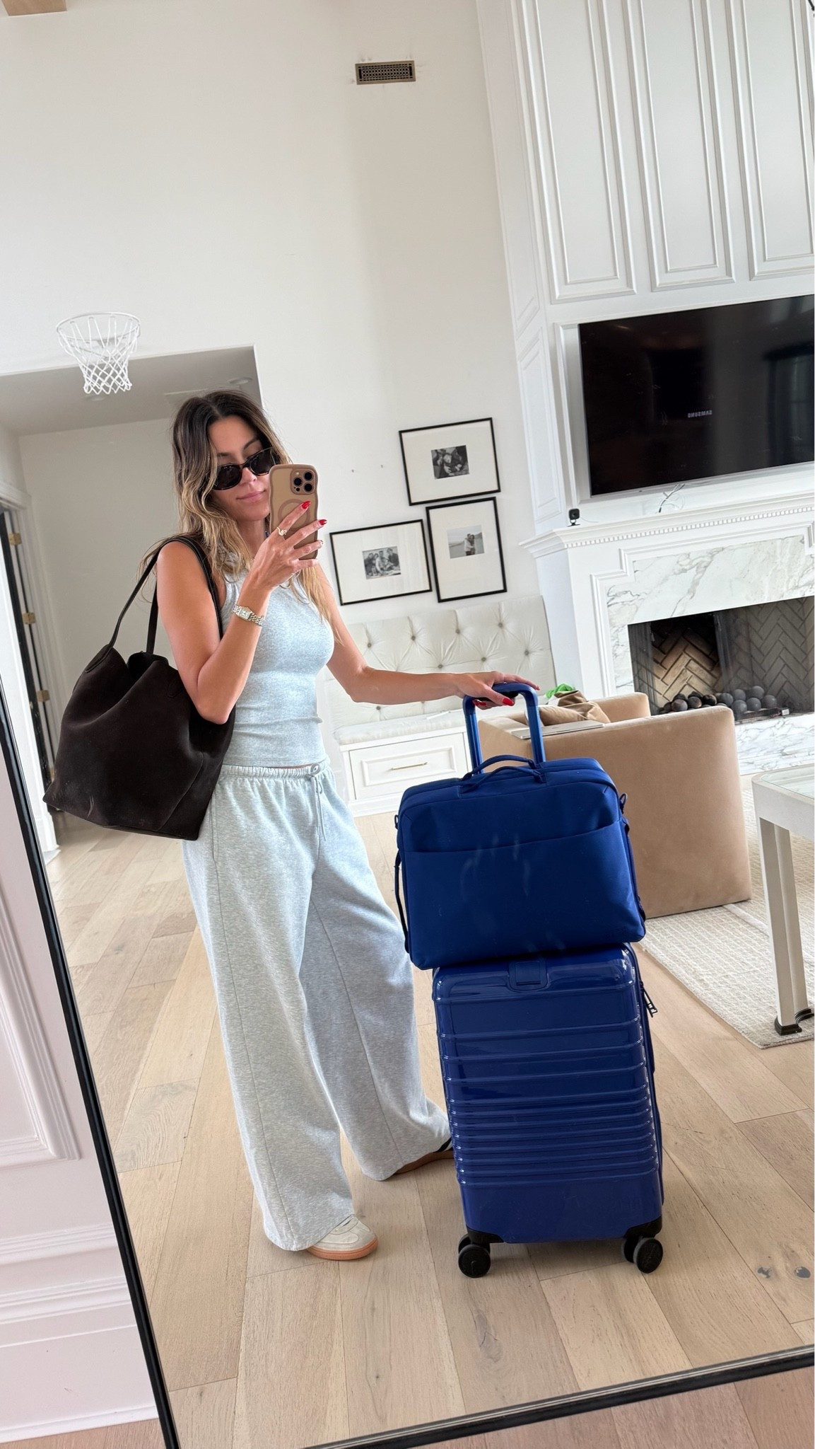 Casual travel outfit 〰️ my @beistravel luggage is on sale at Nordstrom and this gray ribbed top is so flattering and comfy for travel!

#LTKootd #LTKTravel #LTKOver40