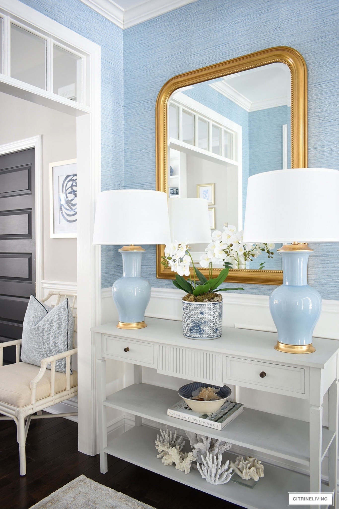 Our gorgeous new gold leaf mirror, and chic blue lamps elevate our entryway and our home! The perfect compliment to our blue faux grasscloth wallpaper

#LTKHome #LTKSeasonal
