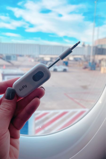 Airfly Bluetooth headphone adapter. In flight entertainment. Headphone adapter. 

#LTKtravel #LTKfindsunder50