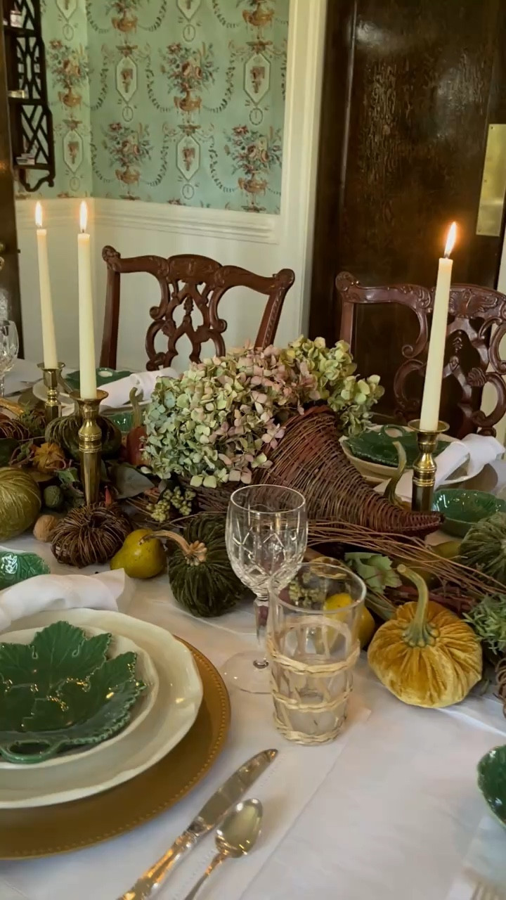 Ever wonder how to create a fall tablescape that feels like a cozy stroll through the woods? This design from a few years ago is one of my favorites, and here’s why: it’s all about layering autumn’s rich, earthy colors—think deep browns, forest greens, golden hues, and pops of crimson. 🍁

The magic starts with two twig swags as the base, paired with a low-profile wicker cornucopia filled with dried hydrangeas (perfect for keeping conversations flowing across the table!). I added brass candlesticks with ivory candles, velvet pumpkins, dried fruits, and those gold pheasants that always steal the show. 🍂

To complete the look, I mixed vintage dinnerware, glassware, and silver for a classic, inviting touch. It’s a timeless combo that makes any fall gathering feel extra special. 🍂

Which fall color palette are you loving this year—traditional or something unexpected? Let me know in the comments! 🍂🐿️🍁

#FallTablescapeIdeas #AutumnDecorInspo #VintageTableDecor #CozyFallVibes #HostessTips #SeasonalTablescape #ThanksgivingTable #WarmAndInviting #HydrangeaDecor #TraditionalFallDecor"

#LTKSeasonal #LTKStyleTip #LTKHome