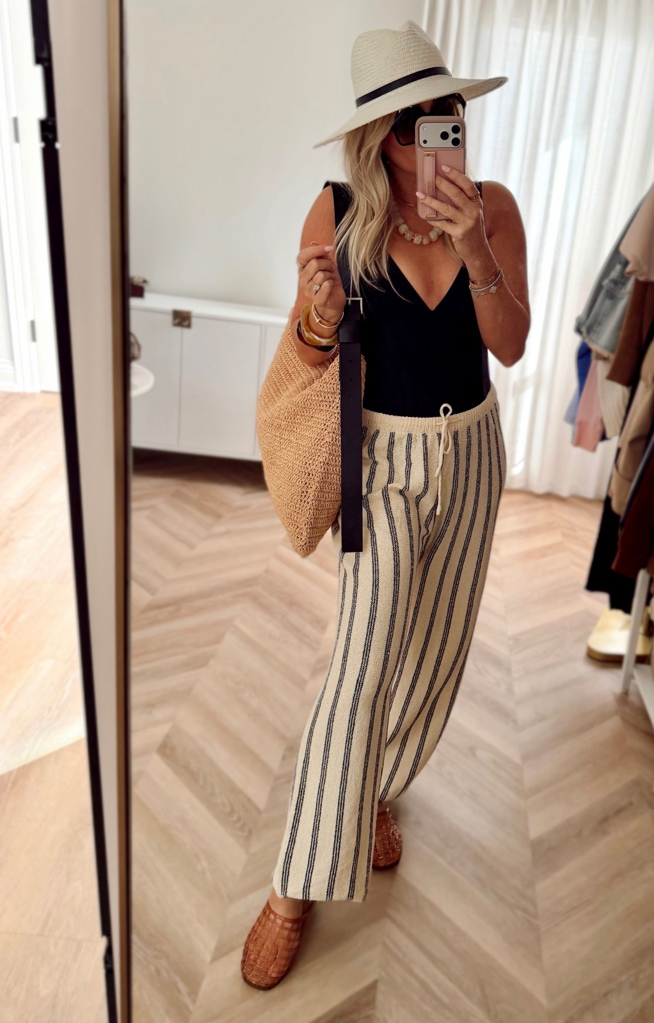The chicest beach combo 🖤 my swimsuit is 30% off today! these cover up beach pants are fully in stock and such a must for throwing on over your suit. Paired with this classy black one-piece that has the best tummy control — so flattering and timeless. I’m wearing a small 🙌

Use code **LaurenL15** for 15% off 🔗

vacation outfits beach, resort wear 2026, spring outfits, spring dresses, Swimsuit, Cover up, swim, spring break.

#LTKSeasonal #LTKSwim #LTKSaleAlert