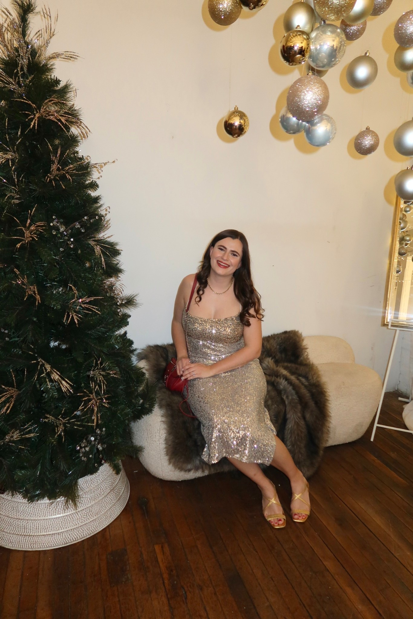 Sequins are perfect for the holidays! I rented this sequin dress from Sachin & Babi and linked some similar options for you. I paired it with gold heeled sandals and a red purse. A simple gold necklace finished off this Christmas party look!

#LTKSeasonal #LTKHoliday #LTKootd