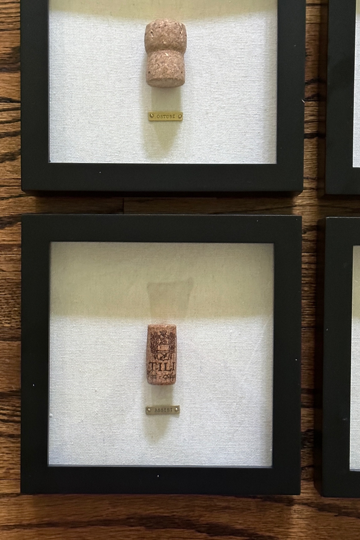 I made these shadow boxes using wine corks that I saved from Italy! The custom brass tags with the city name on them make them feel so upscale and expensive but it was actually so affordable and easy to put together! I love how they are pieces of personalized art from a trip we will always remember!

#LTKhome #LTKunder50 #LTKtravel