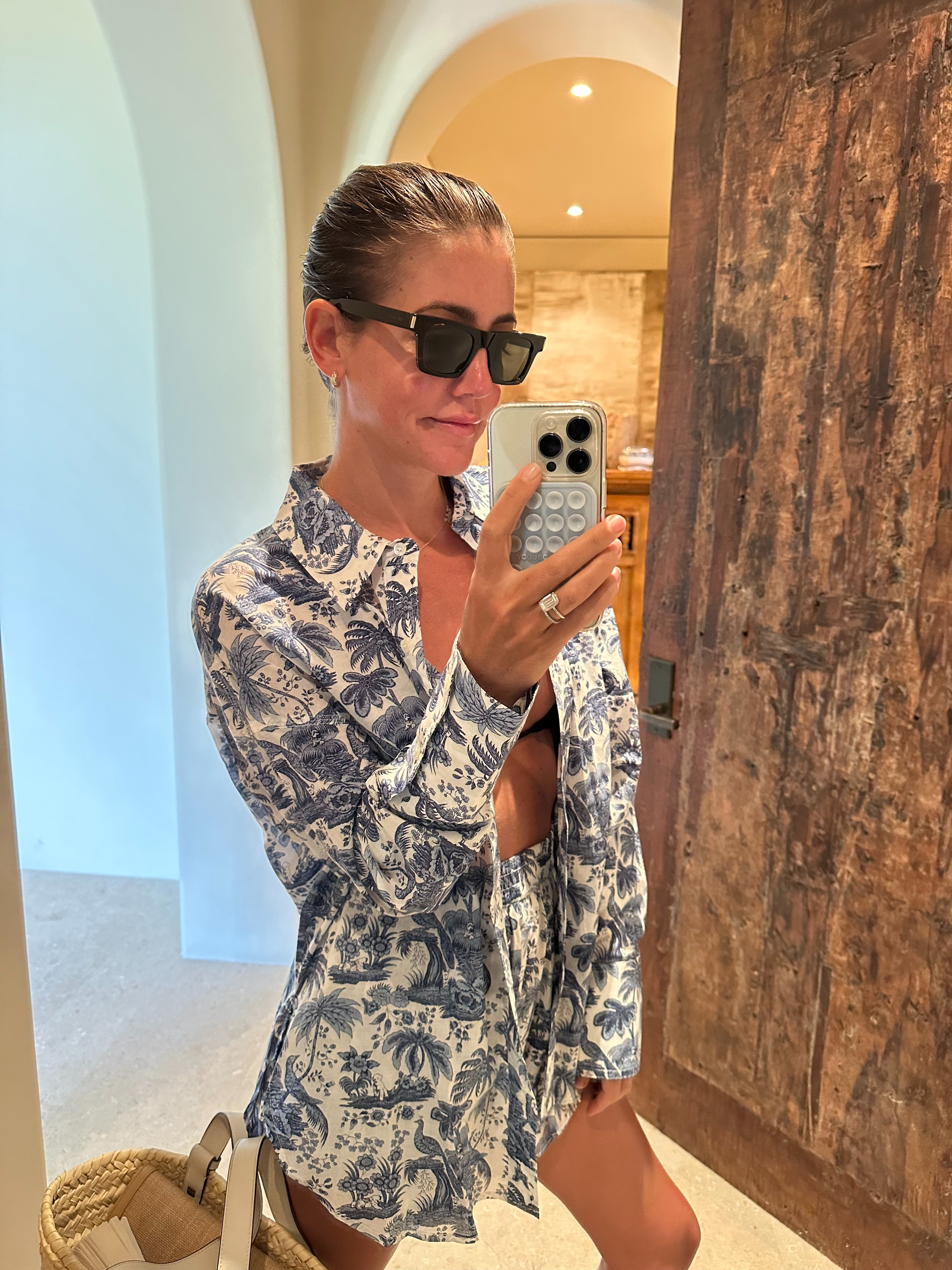 saint laurent sunnies // staud top // staud shorts // eres bikini // loewe bag 

 