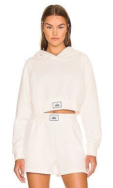 alo Quilted Arena Cropped Hoodie in Ivory from Revolve.com | Revolve Clothing (Global)