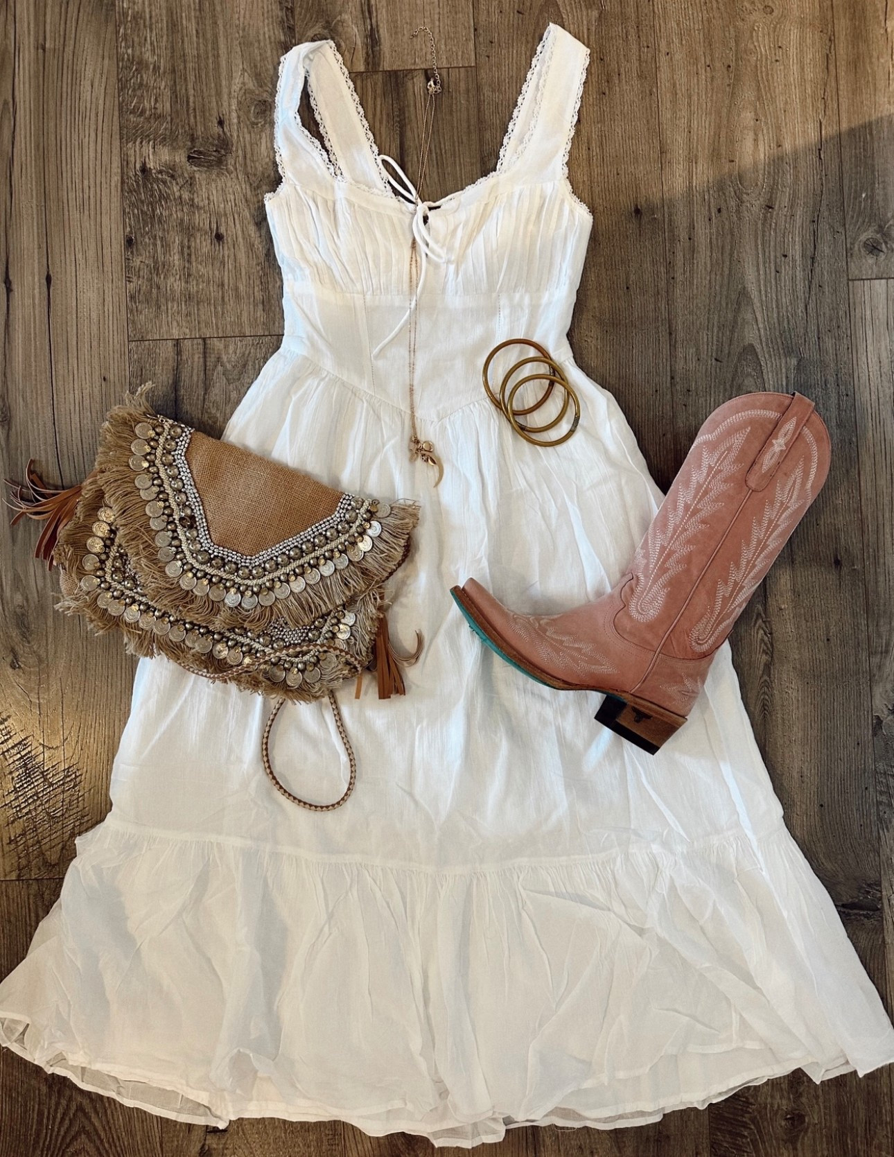 Love this white maxi dress from American Eagle! It has adjustable straps that unbutton - which would make this breast-feeding/nursing friendly for the Mom to be!! This comes in three different colors and patterns!! I’ve styled it with some pink cowgirl boots, which I think is a fun pop of color linking my exact pair below and similar pink cowgirl boots as well!

This would be such a cute Easter dress + outfit for church! 


#LTKSpringSale #LTKStyleTip #LTKFindsUnder100