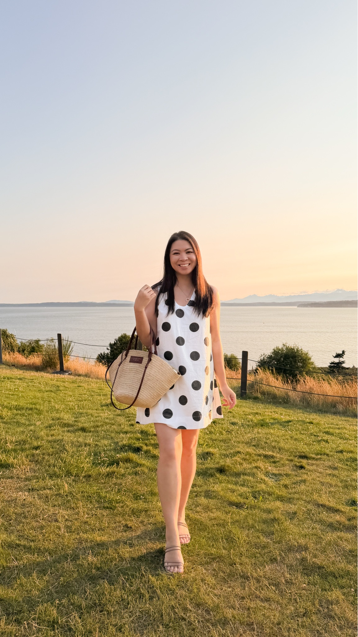Polka dot summer dress with Sezane straw bag and cute Crocs Sandals.

#LTKsummer #LTKstyletip #LTKdresses