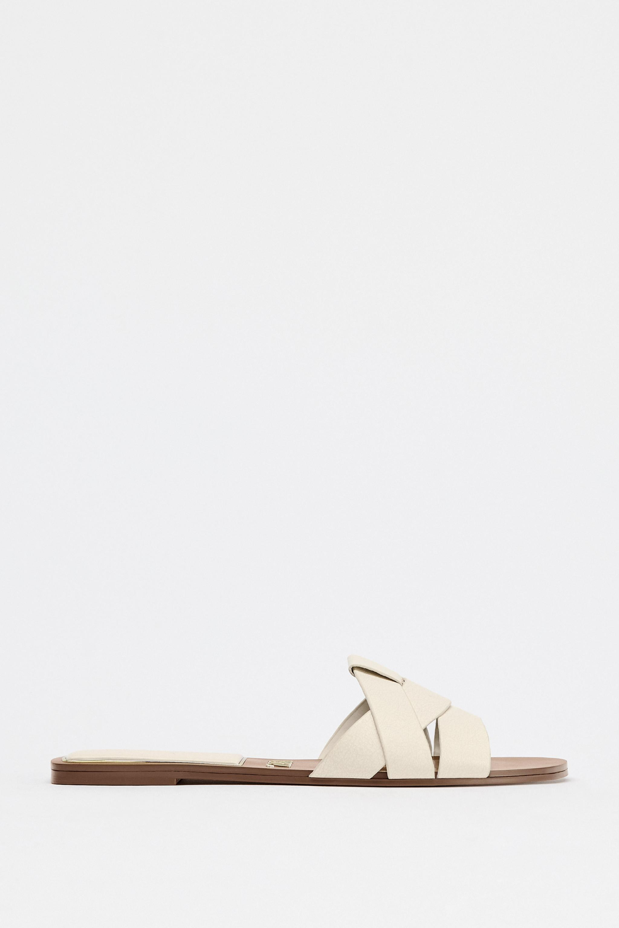 FLAT CROSSED LEATHER SANDALS | Zara US