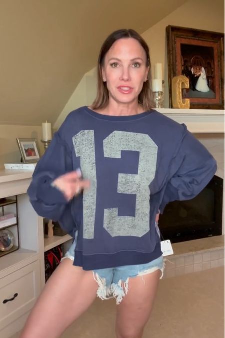 13 is my favorite number! So of course I had to buy this sweater! So big and cozy! Perfect for cooler summer nights or even football games in the fall. Wearing size small. Paired with Jean shorts. Size 25

#LTKFamily #LTKSeasonal #LTKTravel