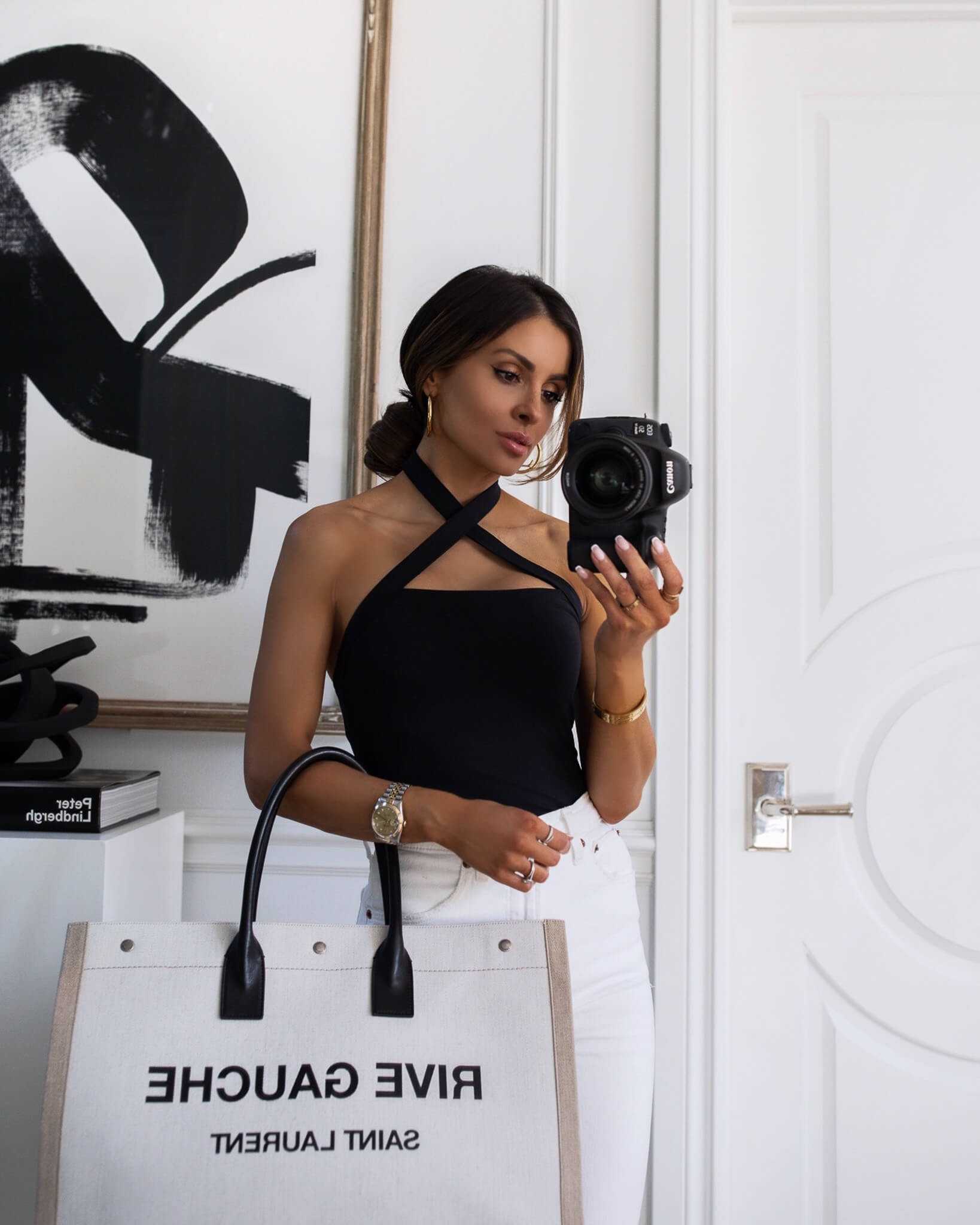 Casual spring outfit
Black halter top
Abercrombie white jeans
Saint Laurent rive gauche tote 



#LTKsalealert #LTKstyletip #LTKunder100