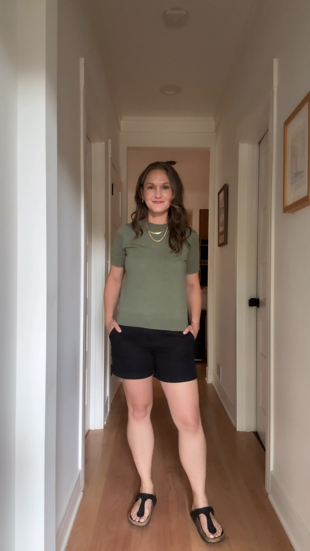 On a breezy Friday in July, this cool stay-at-home city mom looked perfectly pulled-together in black chino shorts and a short-sleeve olive green sweater that said “I’m relaxed but also on top of my inbox.” Her black Birkenstocks carried her through the day with ease, while her gold hoops, herringbone chain, graduated rope necklace, and freshly stacked permanent bracelets added just the right sparkle to her hustle. At their cowork/daycare space, she powered through grading student papers, whipped up a couple of blog posts with her signature wit, and sent off a flurry of emails to a few powerhouse women helping turn a little dream into a big, bold, beautiful passion project.

#LTKStyleTip #LTKWorkwear #LTKFamily