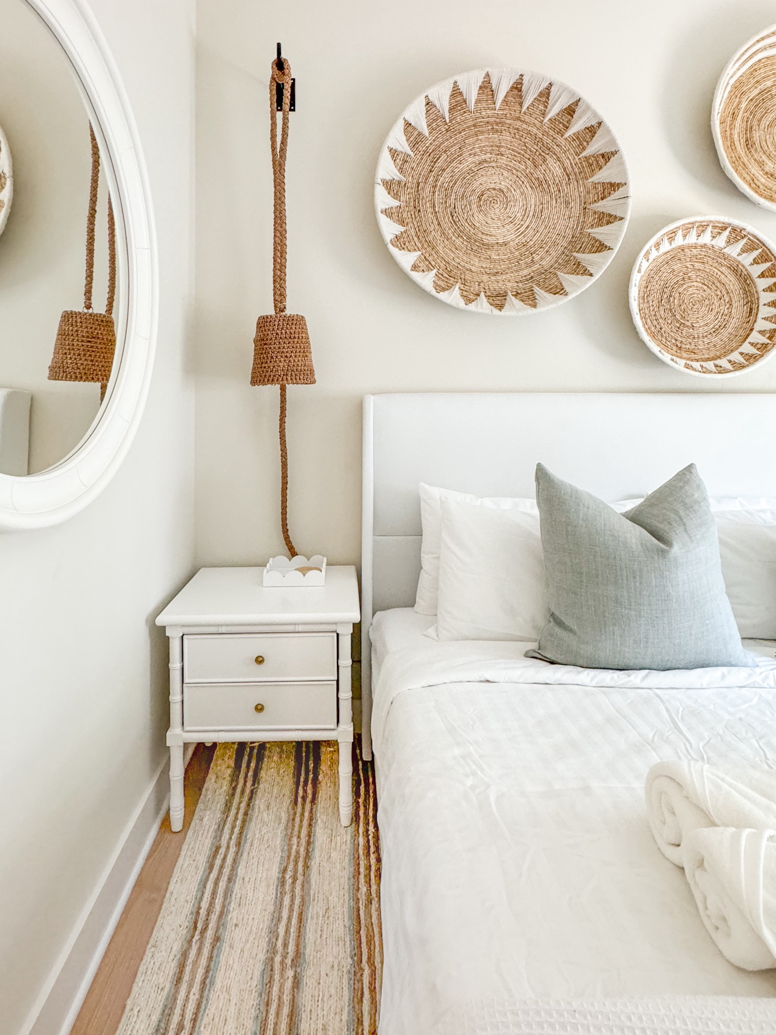 Sneak peek of one of the Hola Beaches Casita bedrooms! I decorated with this white upholstered bed, white bamboo nightstands, light blue linen pillow, basket set, rope pendant lights, and a striped jute rug!
.
#ltkhome #ltksalealert #ltkstyletip #ltkfindsunder100 #ltkfindsunder50 #ltkseasonal beach house decor, beach house bedroom, 30A decor 

#LTKSaleAlert #LTKSeasonal #LTKHome
