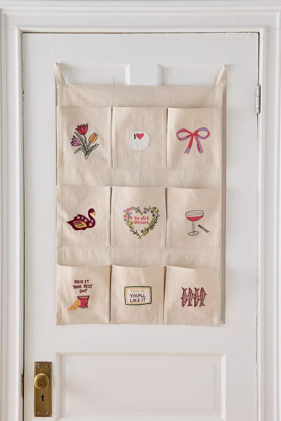Embroidered Graphic 9-Pocket Storage Wall Hanging | Urban Outfitters (US and RoW)