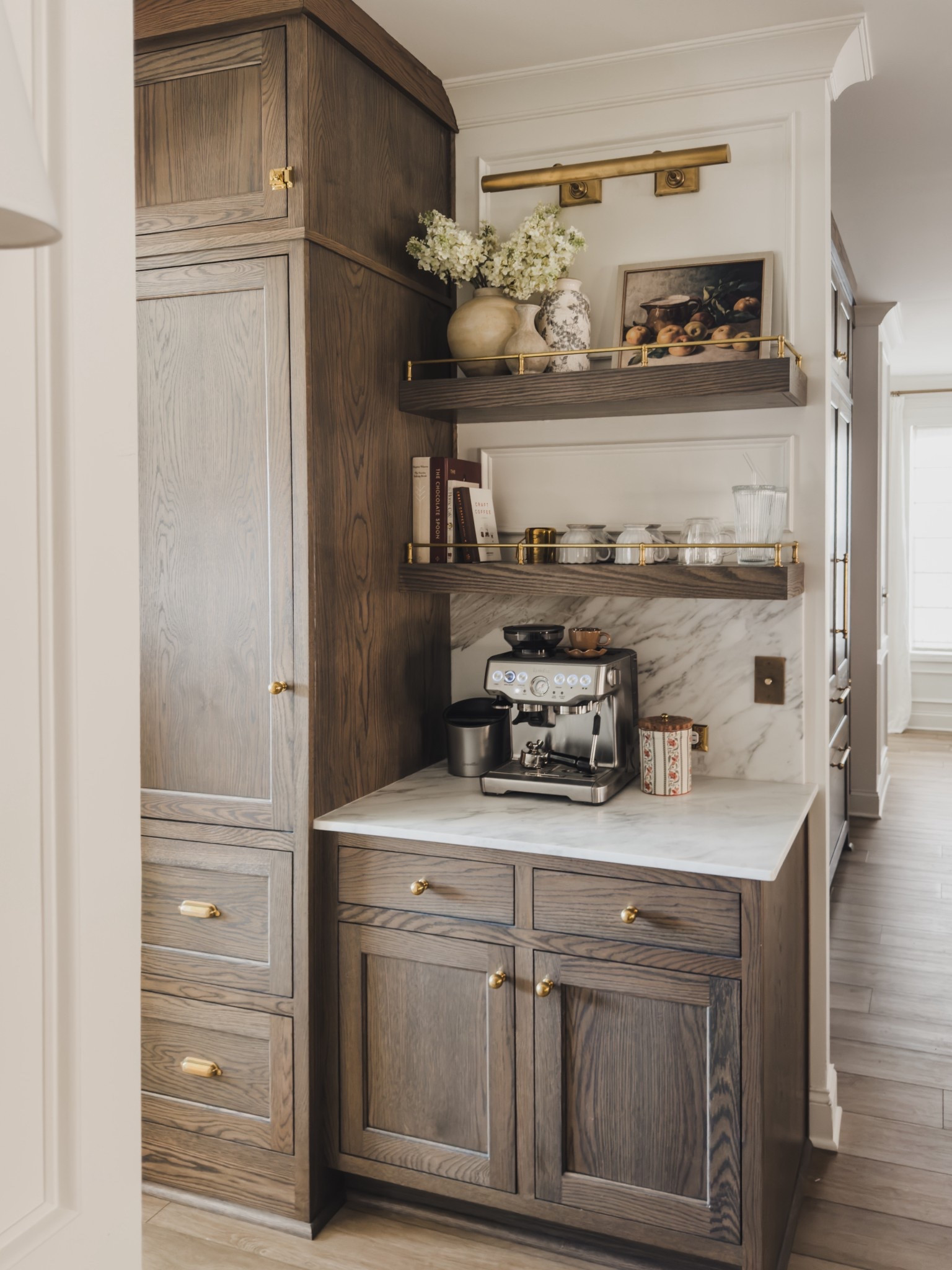 Cozy coffee bar views that utilize both aesthetic and function. From my brass gallery rails to everyday items that look just a great displayed. Sourcing both my favorites unlacquered brass details and great alternatives to achieve a similar style.

Home finds, neutral home inspo, coffee bar views, collected style, rich wood tones, espresso machine, unlacquered brass details, picture light, faux florals, vase details, neutral decor book, brass hardware, coffee mug, spring refresh, linen curtain, Found it on Amazon, Breville, Rejuvenation, Etsy, shop the look!

#LTKHome #LTKSeasonal