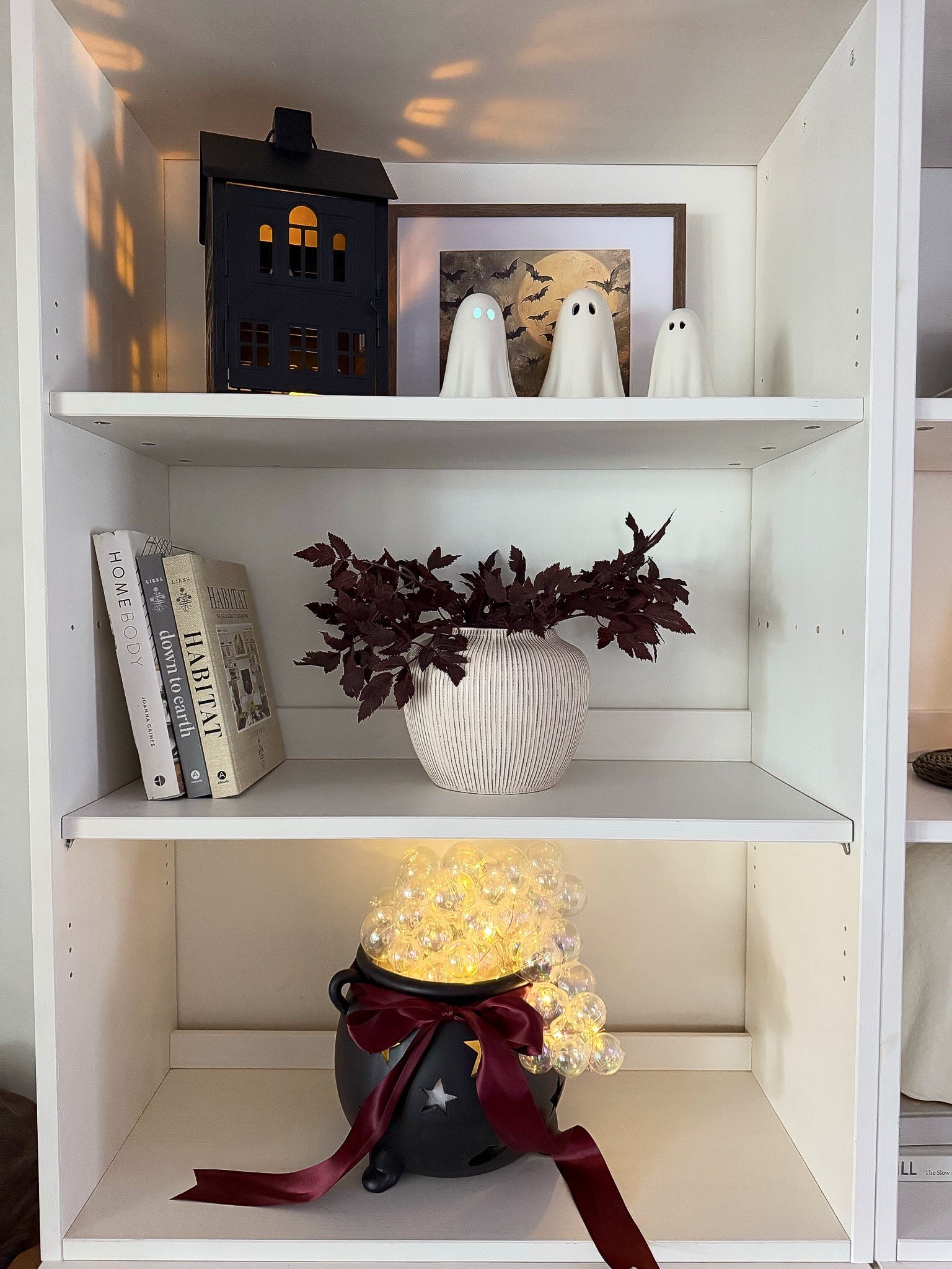 Open shelf styling for Halloween 

#LTKHalloween #LTKSeasonal #LTKHome