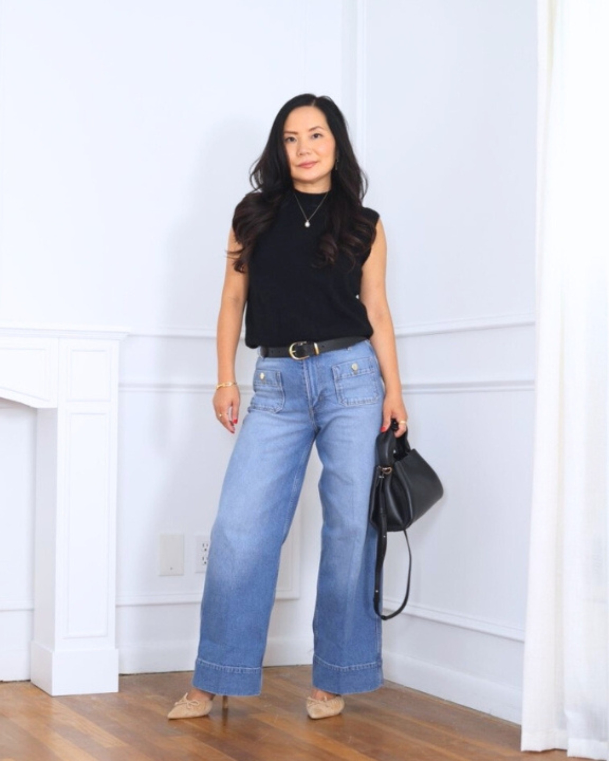 A go-to combo for those effortlessly chic days — a sleek mock neck top and classic bag from Quince, paired with wide-leg jeans from H&M. Simple, comfortable, and polished all at once. I’m 5’2, wearing size XS.

#LTKStyleTip #LTKOver40 #LTKPetite